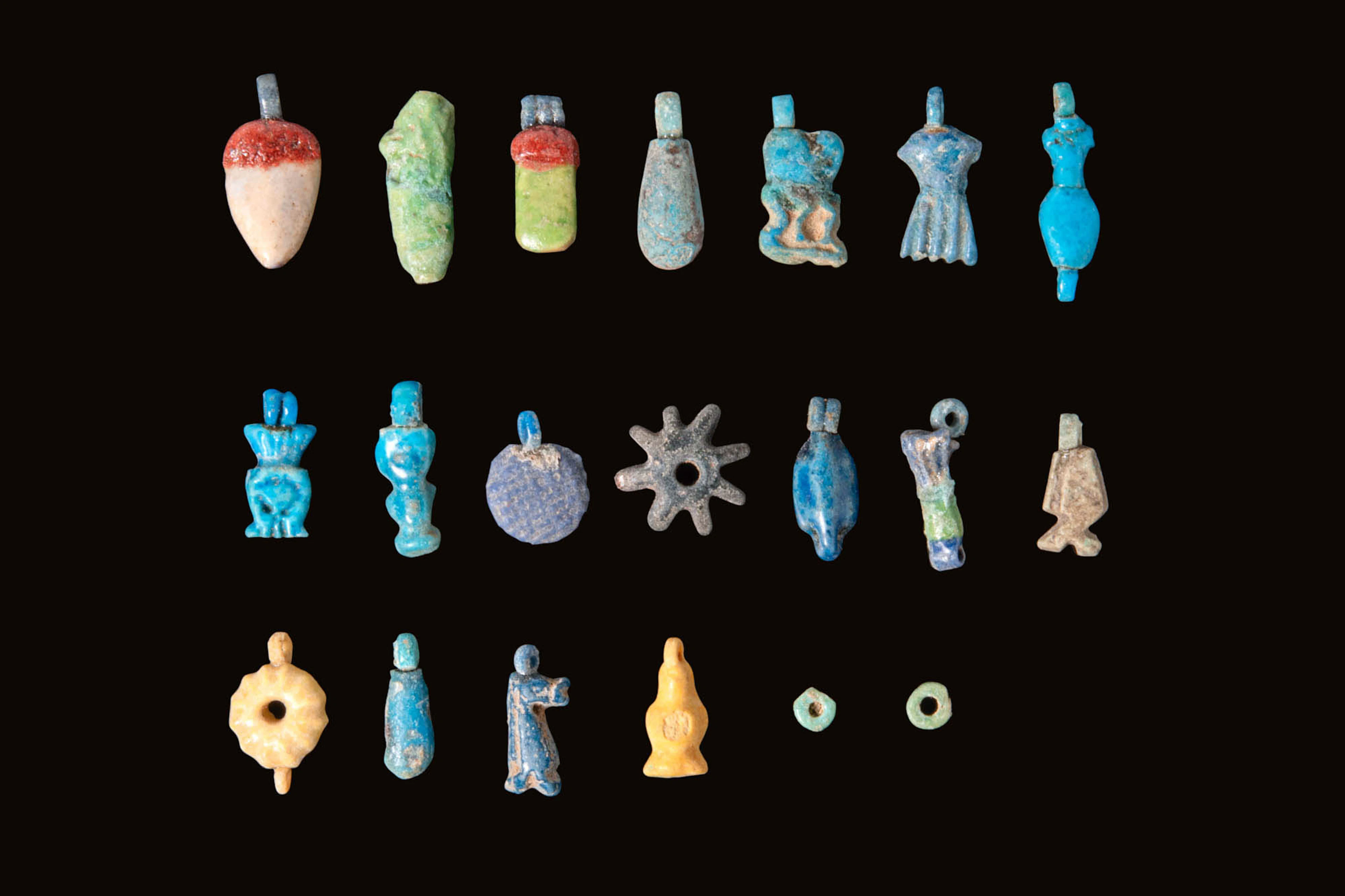 COLLECTION OF EGYPTIAN FAIENCE PENDANTS