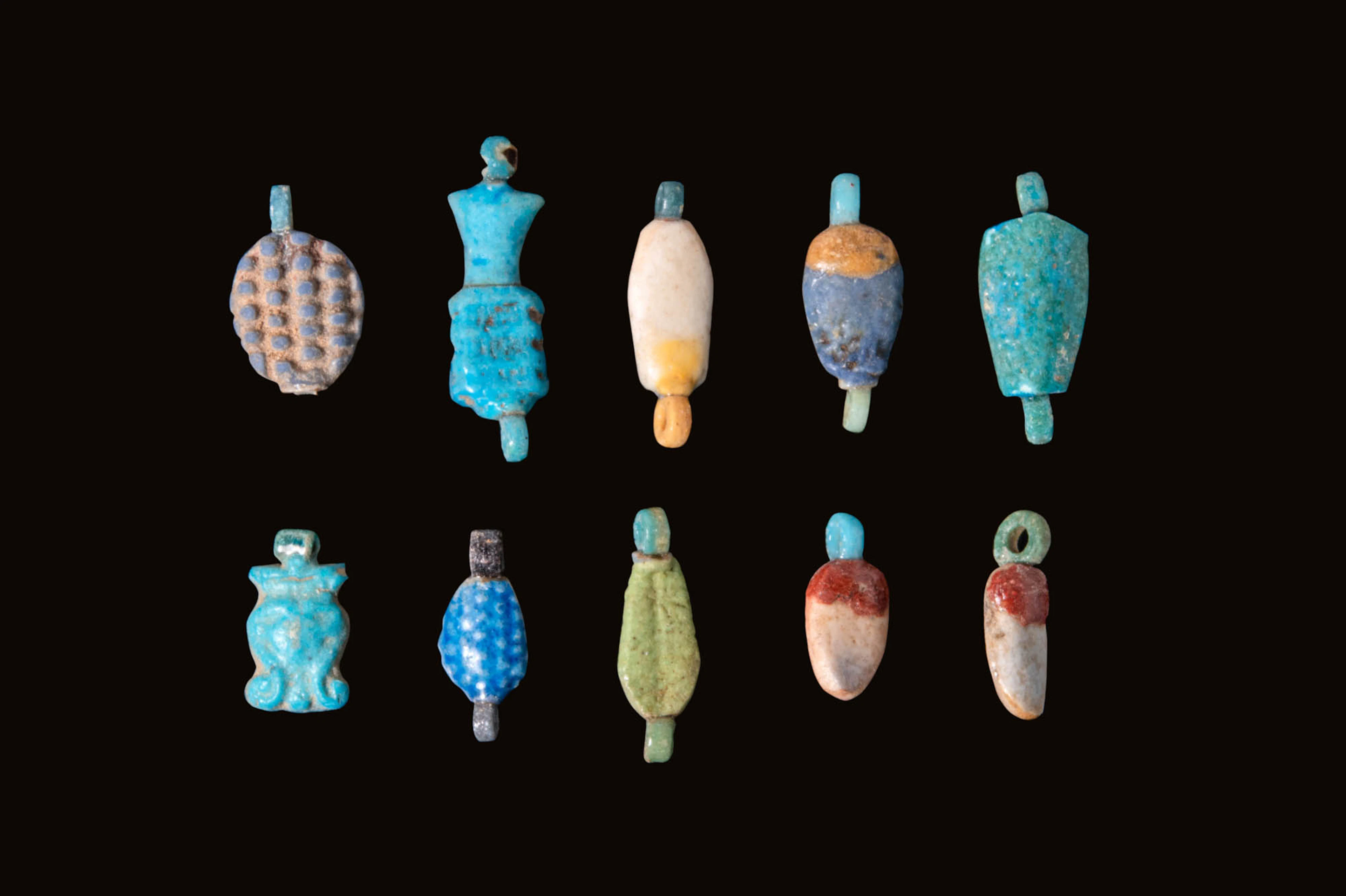 COLLECTION OF EGYPTIAN FAIENCE PENDANTS