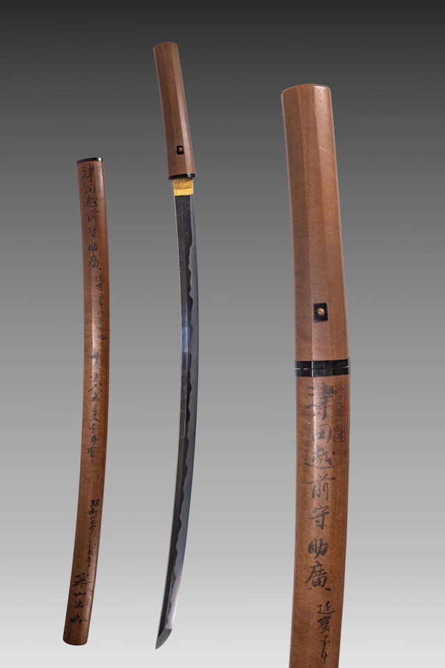 JAPANESE KATANA WITH WOODEN SHIRASAYA AND SAYAGAKI CALLIGRAPHY