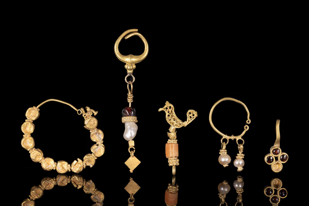 COLLECTION OF GREEK GOLD EARRINGS