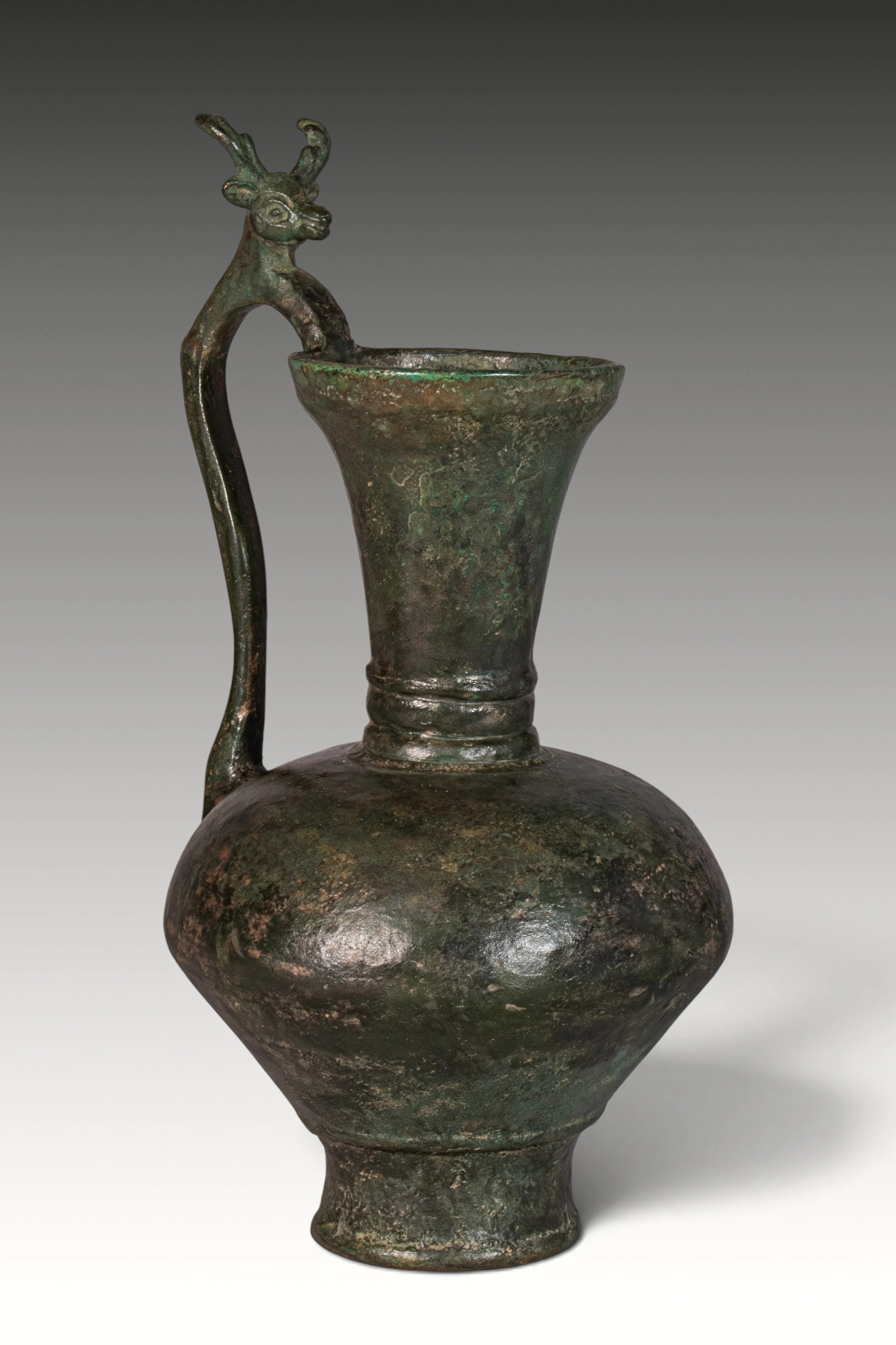 SASANIAN BRONZE JUG WITH STAG-SHAPED HANDLE