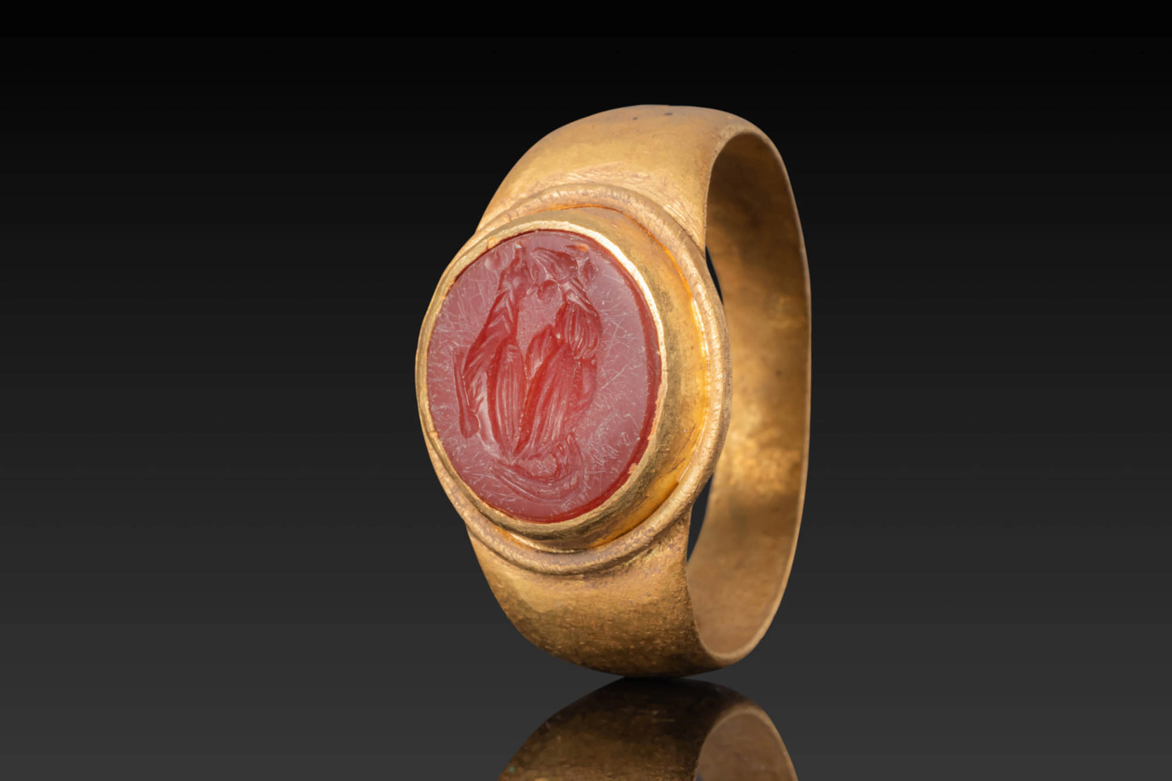 ROMAN CARNELIAN INTAGLIO DEPICTING EROTIC SCENE WITH ROOSTERS IN HIGH