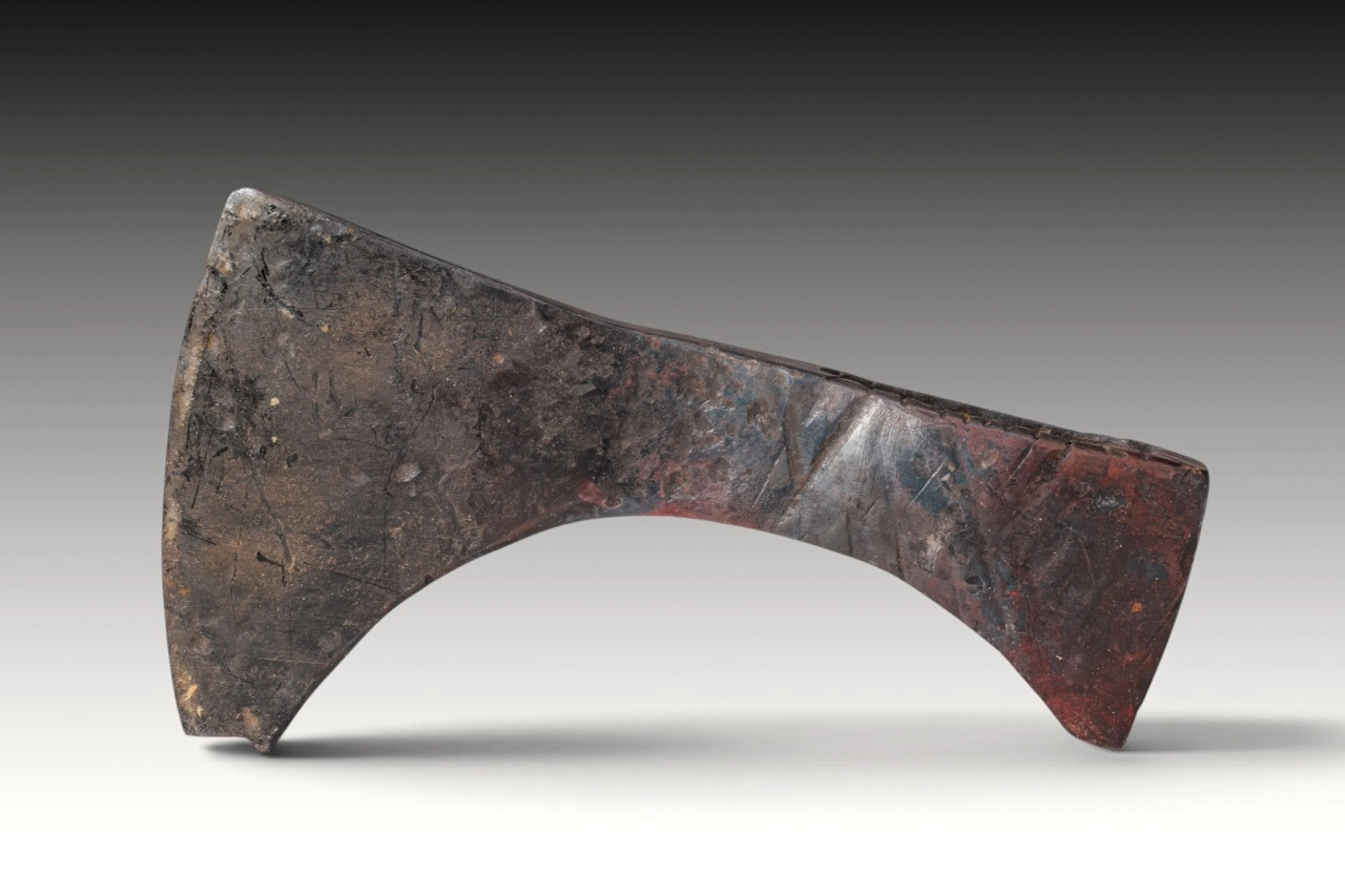 VIKING PERIOD IRON AXE HEAD WITH NOTCHED BUTT