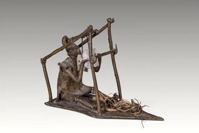 BURKINA FASO FIGURE OF A WEAVER