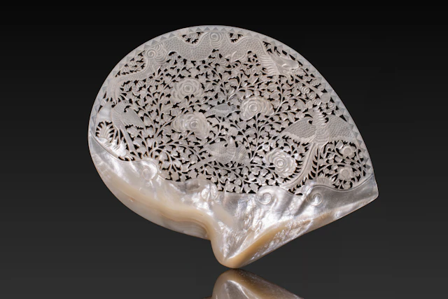 CHINESE CARVED AND PIERCED MOTHER OF PEARL PLAQUE