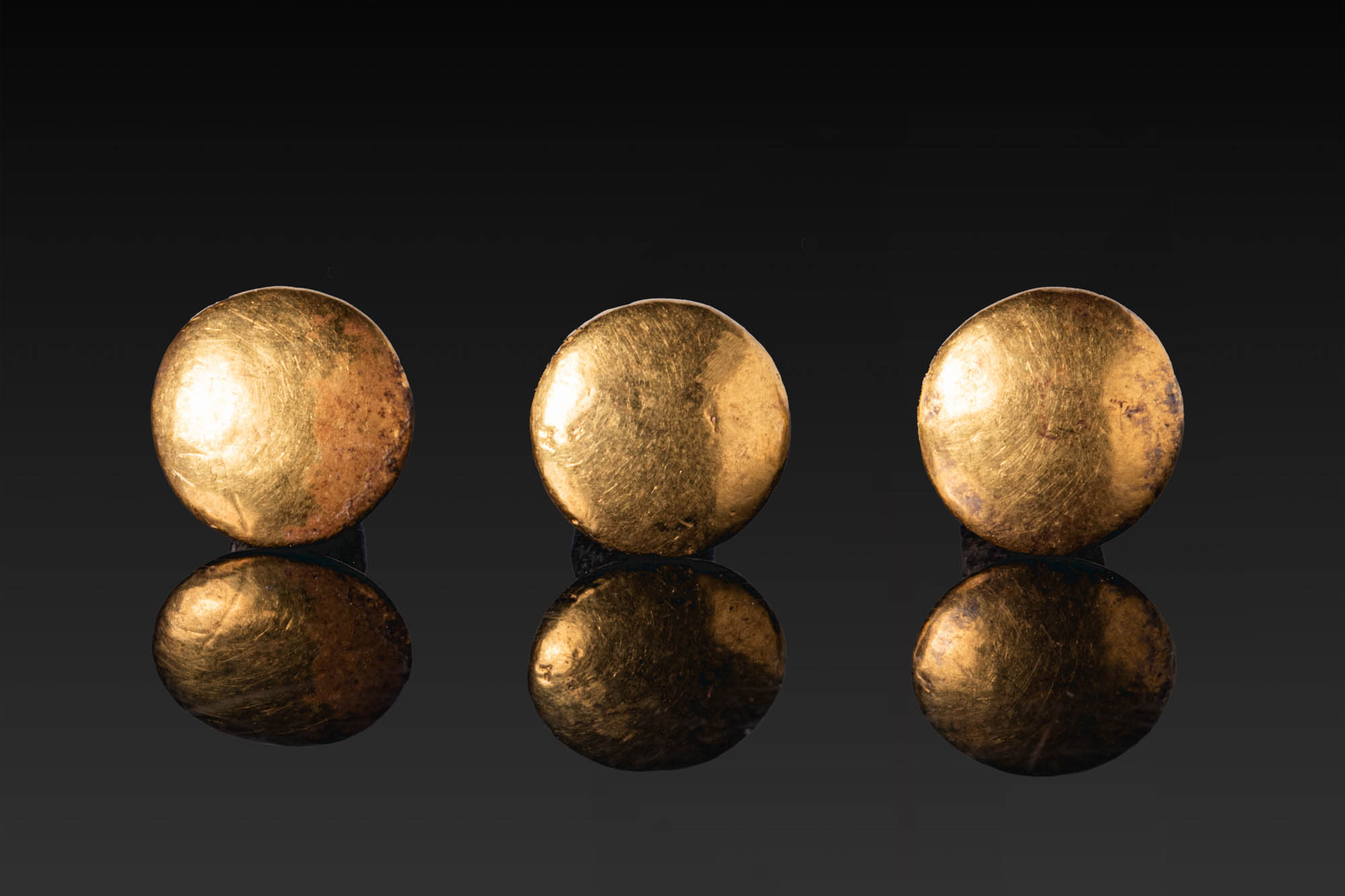 RARE COLLECTION OF EGYPTIAN GOLD AND BRONZE MUMMY EAR PLUGS