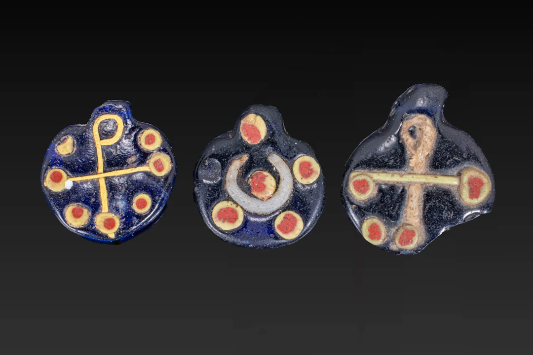 UNIQUE BYZANTINE POLYCHROME GLASS PENDANTS WITH CHI-RHO AND CRESCENT MOTIFS