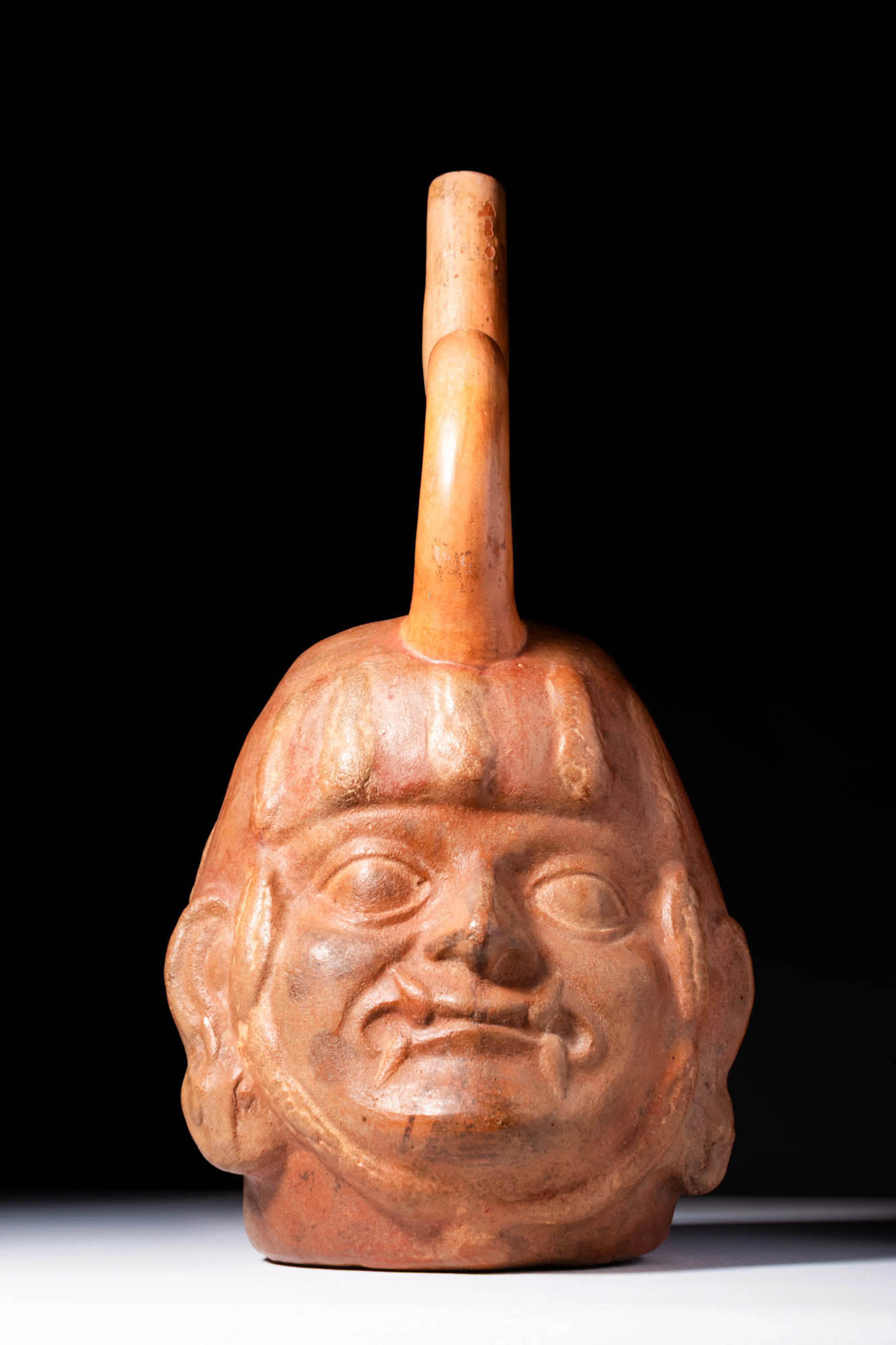 PRE-COLUMBIAN MOCHE CERAMIC EFFIGY STIRRUP-SPOUT VESSEL
