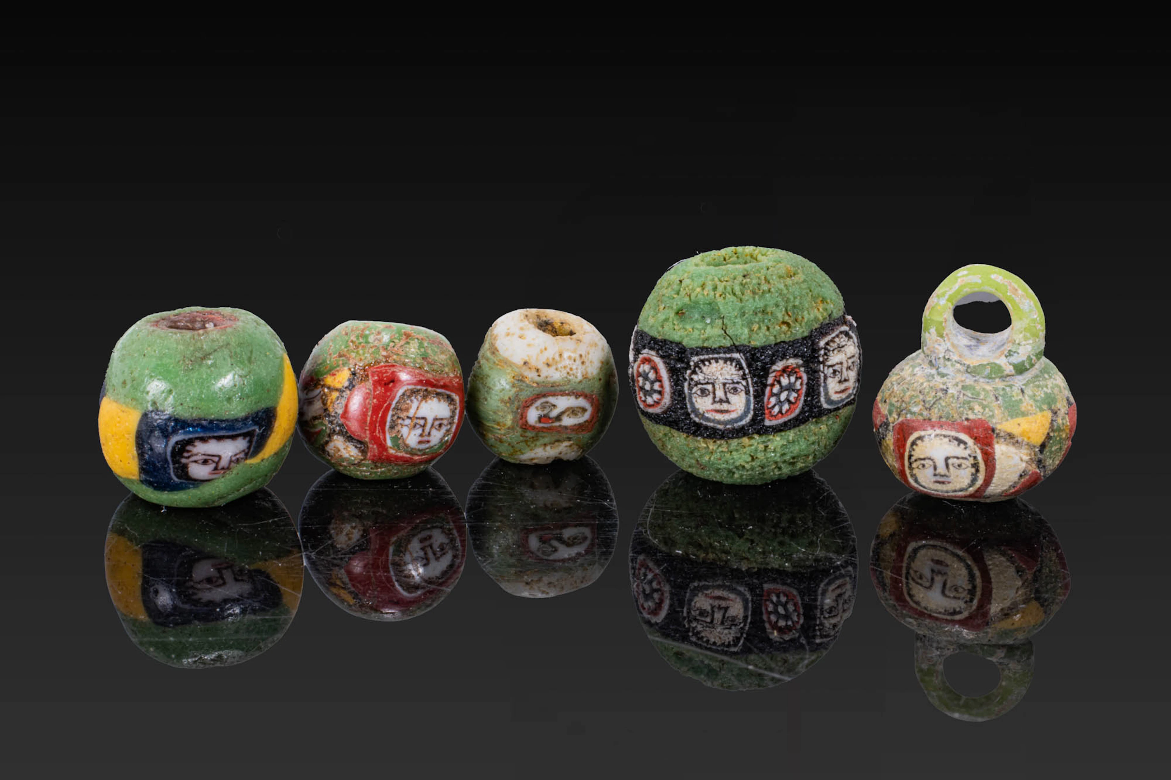 COLLECTION OF ROMAN MOSAIC GLASS BEADS WITH FACES