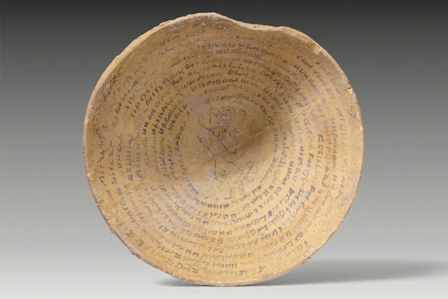 ARAMAIC TERRACOTTA DEVIL TRAP BOWL WITH CENTRAL FIGURE