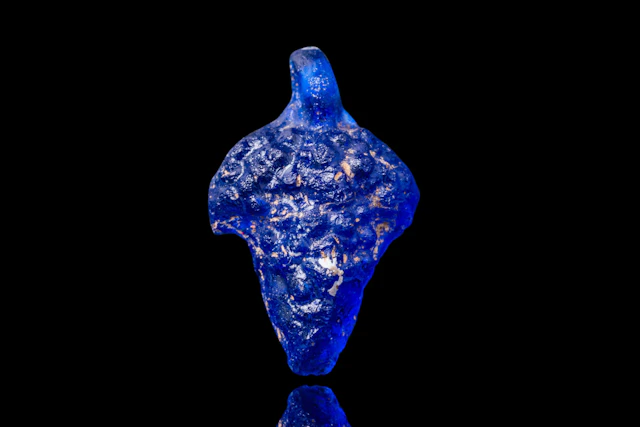 HELLENISTIC BLUE GLASS GRAPE-SHAPED PENDANT