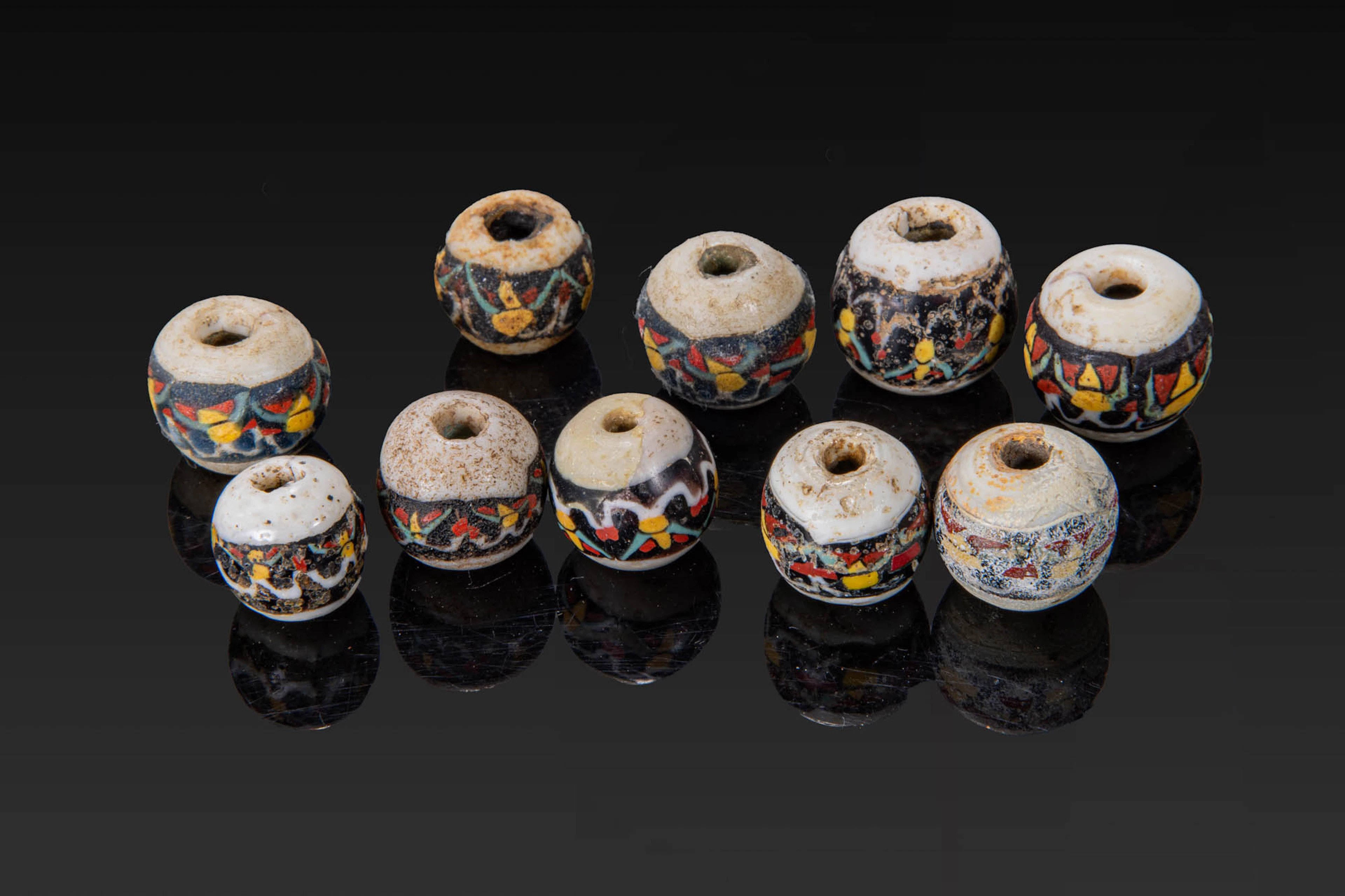 COLLECTION OF ROMAN MOSAIC GLASS BEADS WITH GEOMETRIC MOTIFS