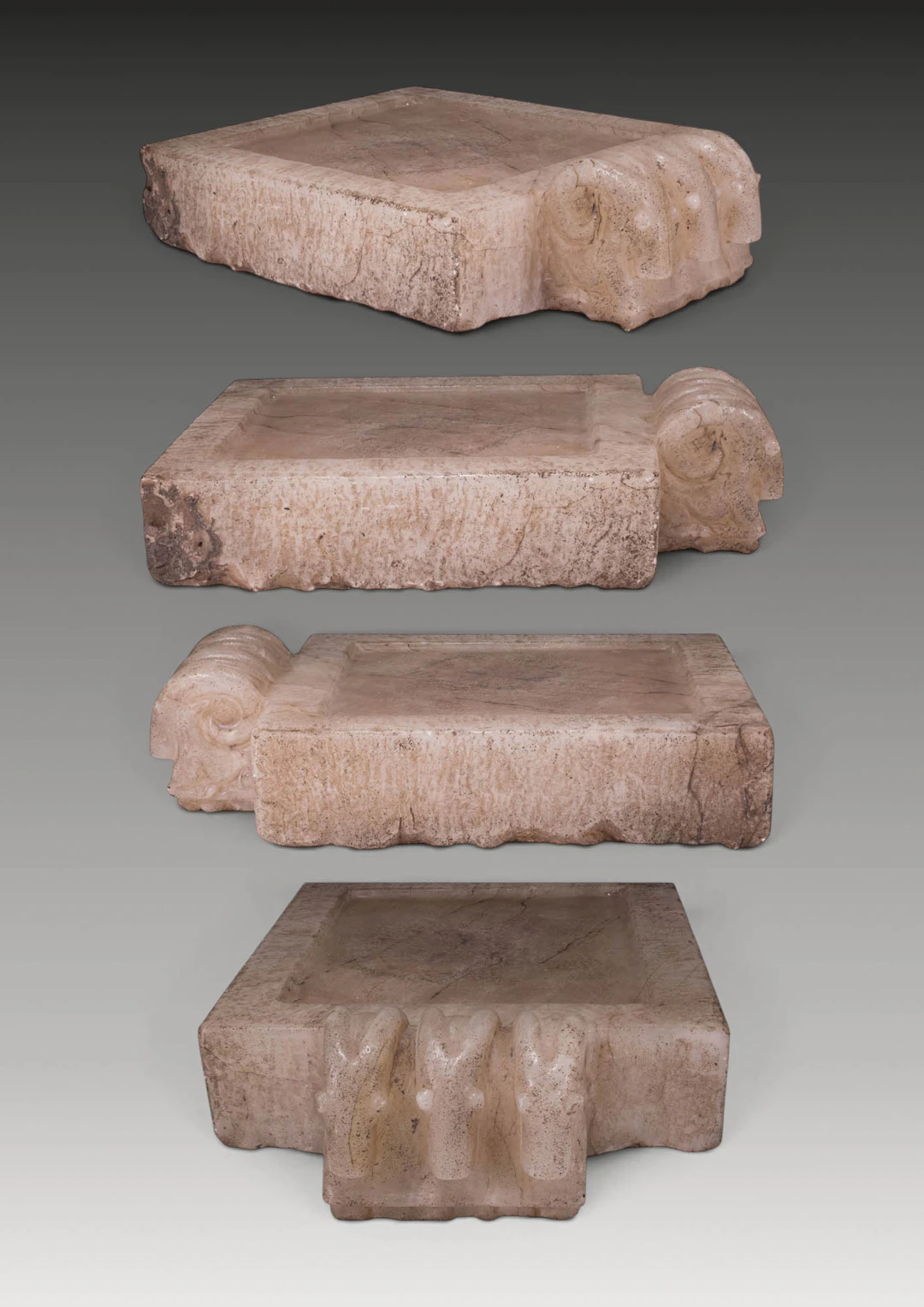 SOUTH ARABIAN MARBLE RITUAL TABLE WITH THREE IBEXES