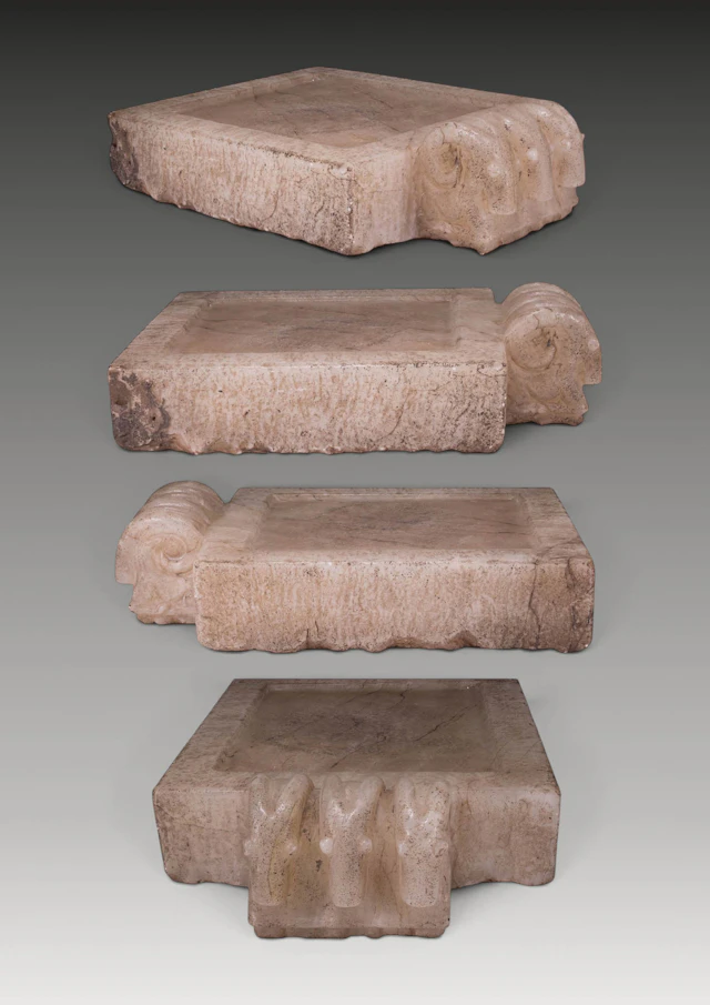 SOUTH ARABIAN MARBLE RITUAL TABLE WITH THREE IBEXES