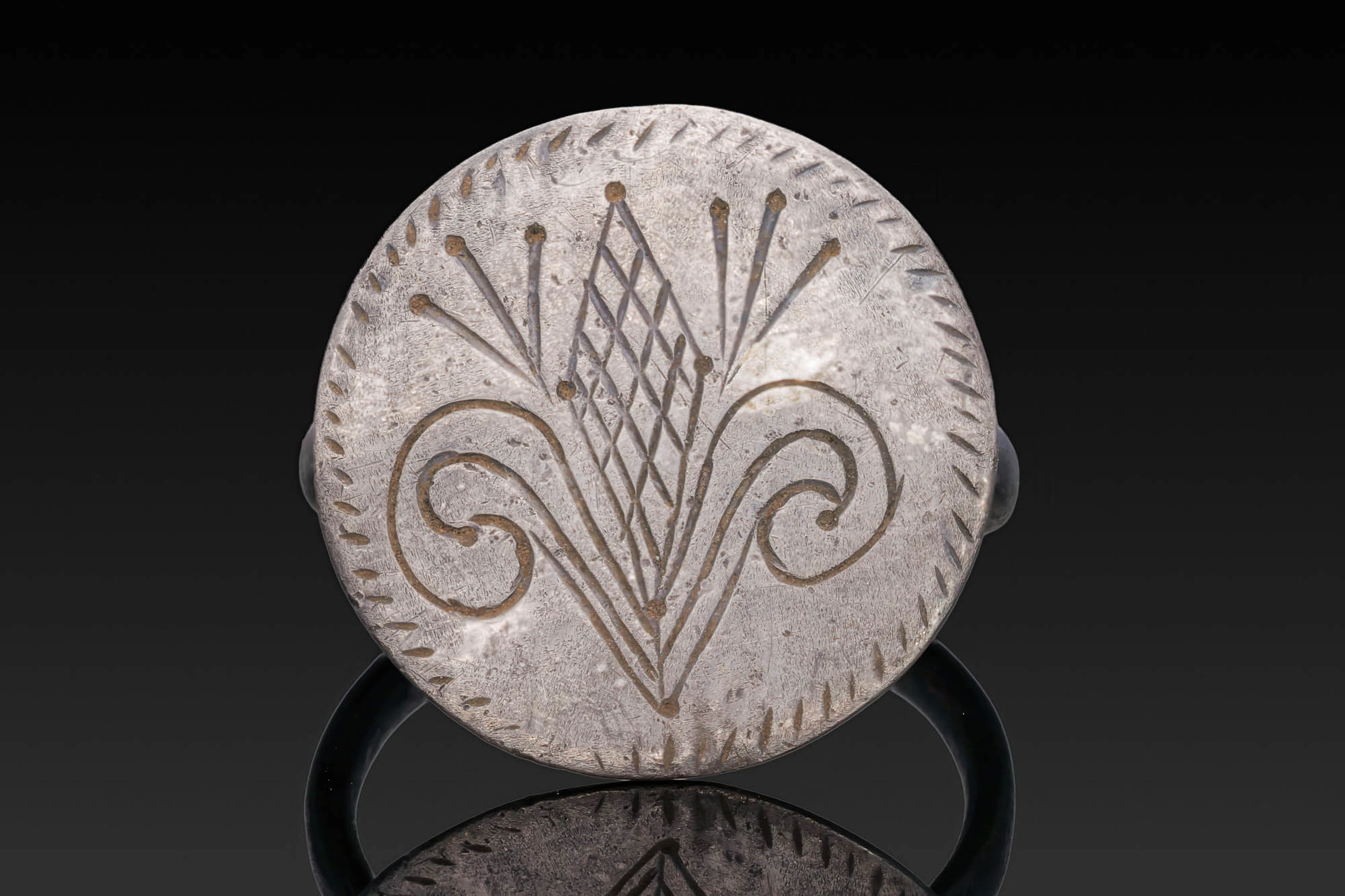 LATE MEDIEVAL SILVER RING WITH FLEUR DE LIS