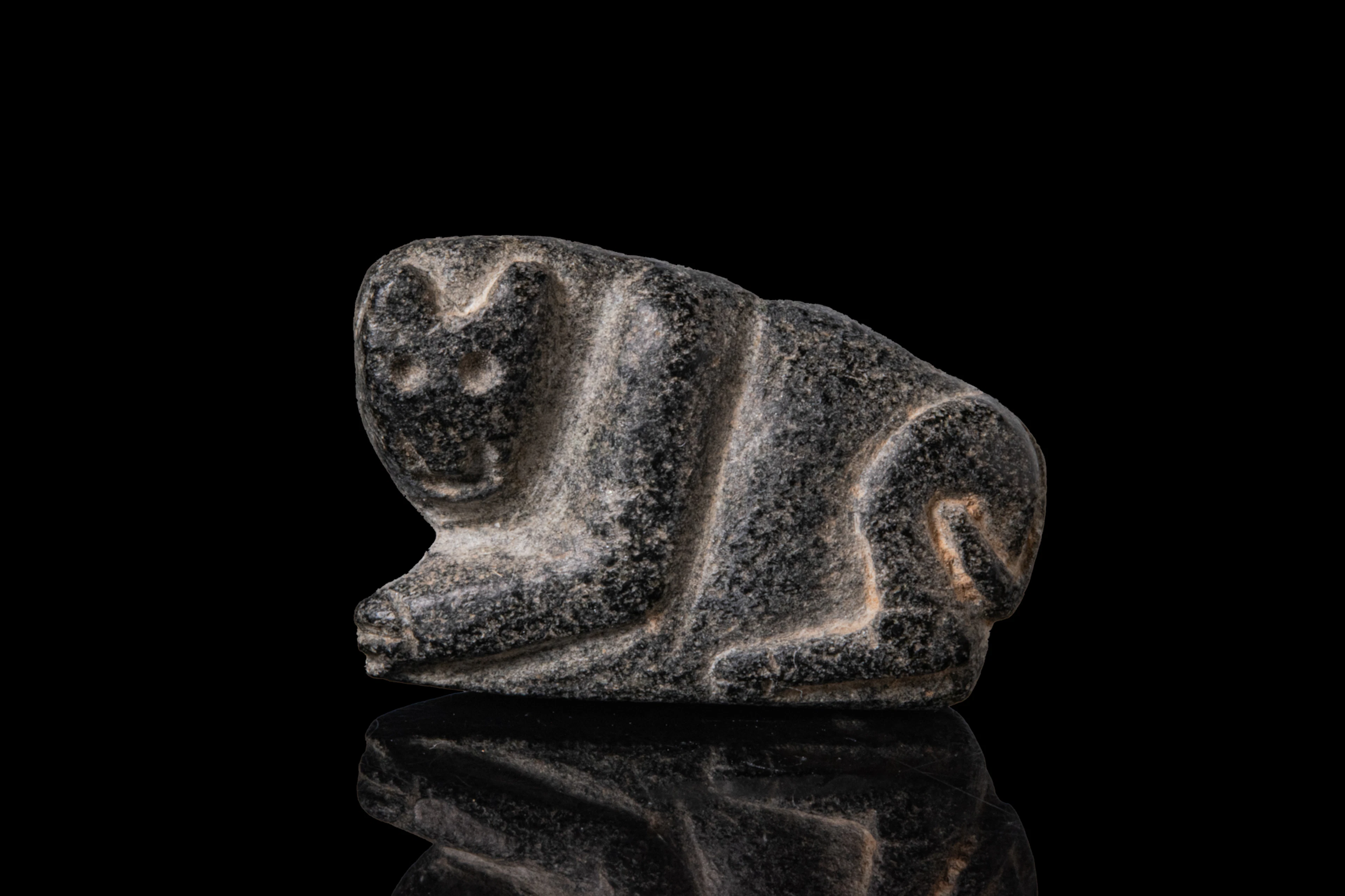 NORTH MESOPOTAMIAN BLACK STONE STAMP SEAL WITH QUADRUPEDS AND DOTS