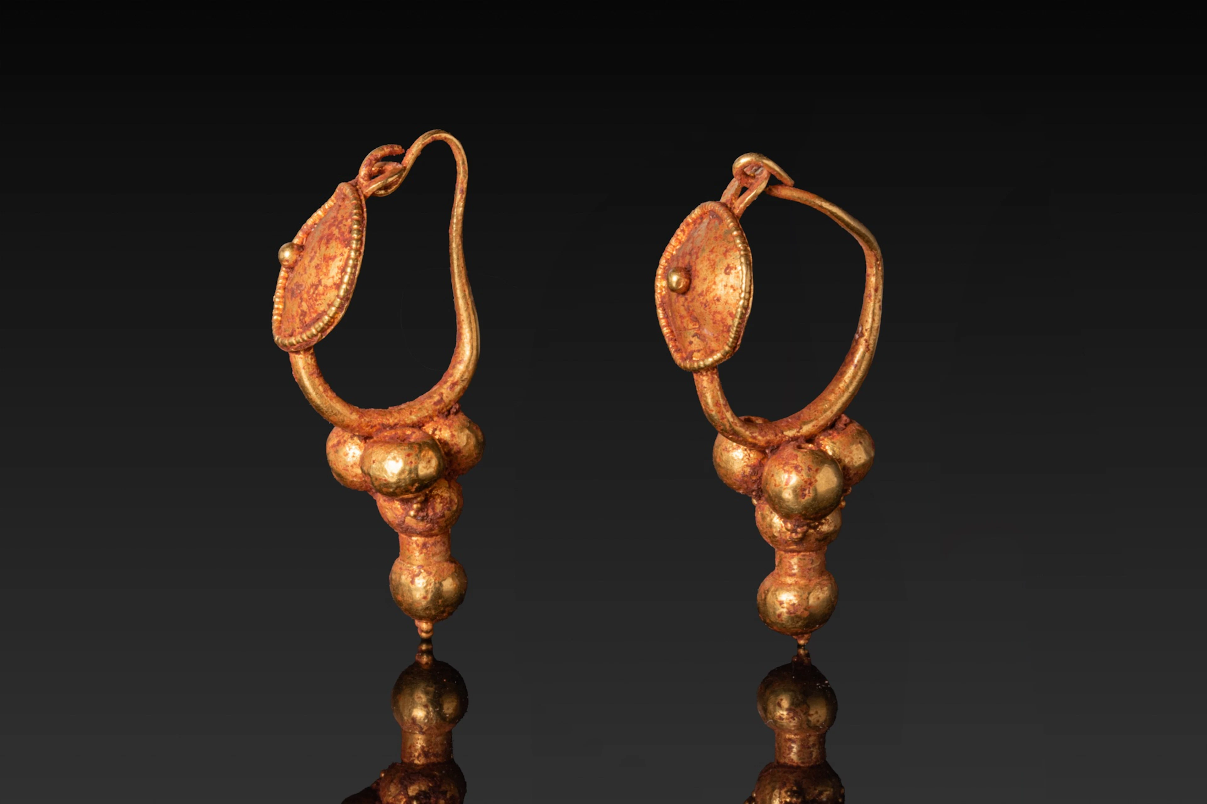 MATCHED PAIR OF ROMAN HIGH KARAT GOLD EARRINGS