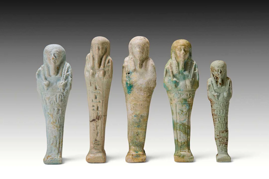 GROUP OF FIVE EGYPTIAN FAIENCE SHABTIS
