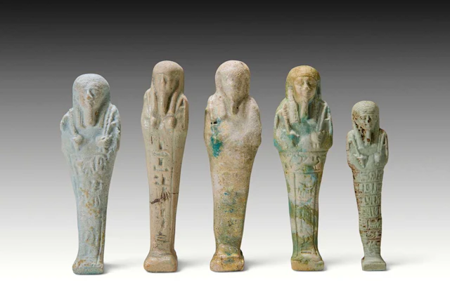 GROUP OF FIVE EGYPTIAN FAIENCE SHABTIS