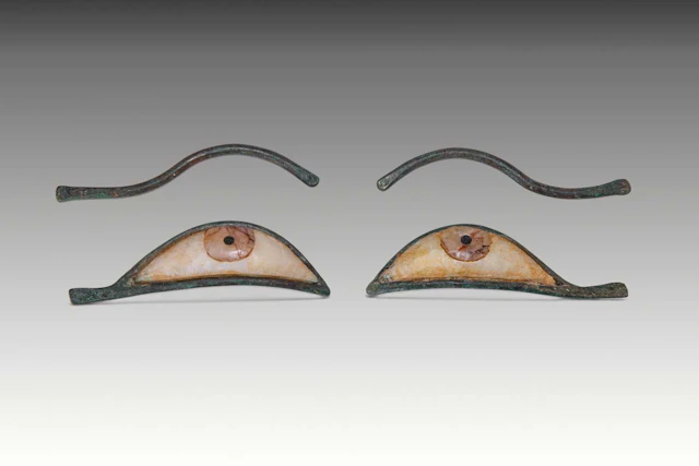 EGYPTIAN BRONZE AND STONE MUMMY EYES WITH BROWS