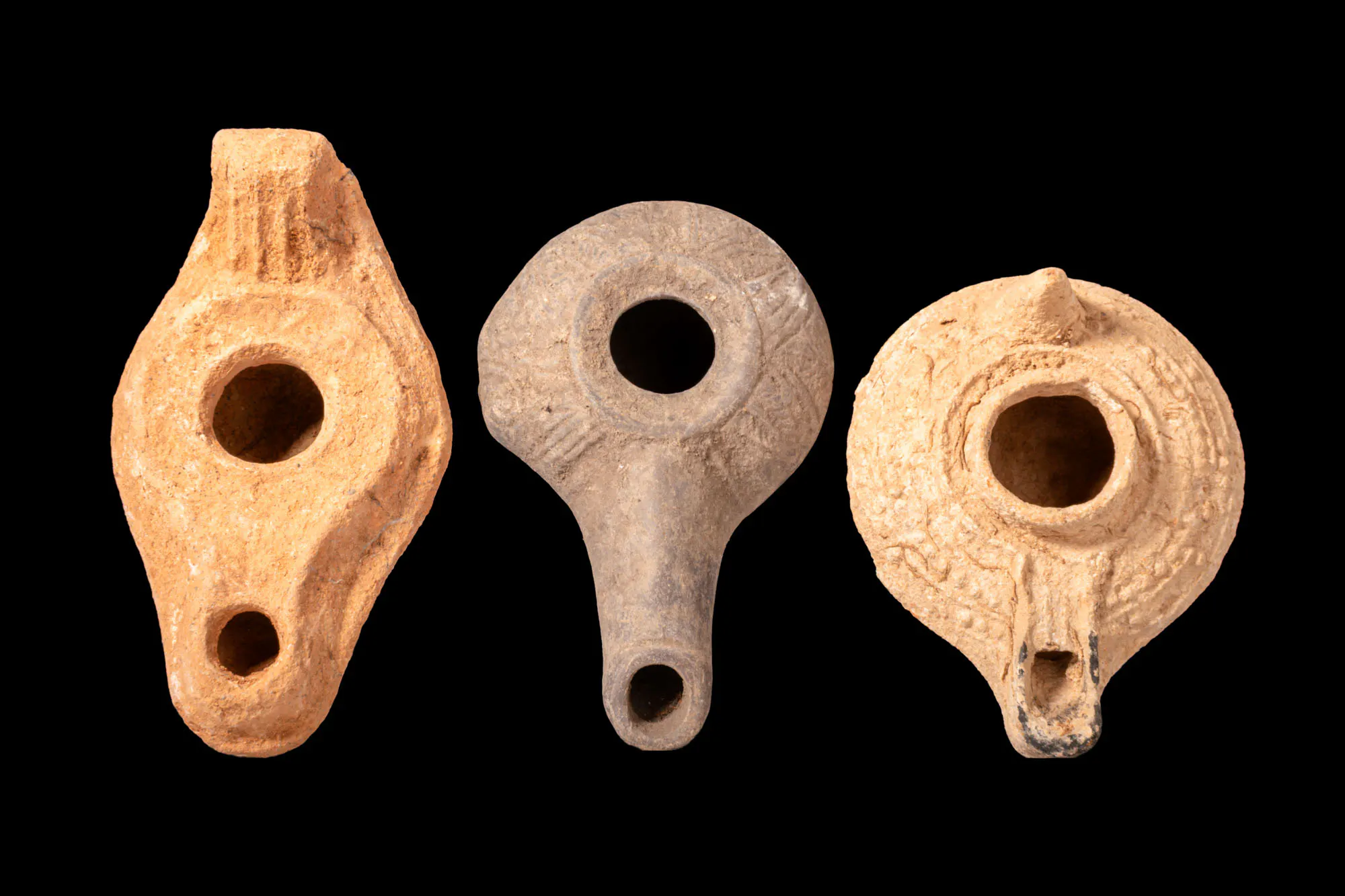 COLLECTION OF GREEK AND BYZANTINE TERRACOTTA OIL LAMPS WITH MOULDED DECORATION