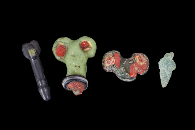 COLLECTION OF GRAECO-ROMAN GLASS PHALLUS-SHAPED AMULETS