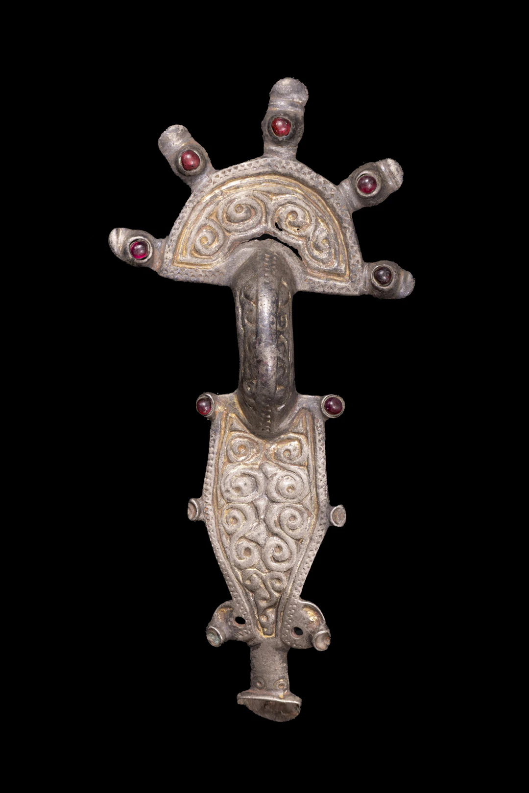 OSTROGOTHIC SILVER-GILT AND GARNET RADIATE BROOCH
