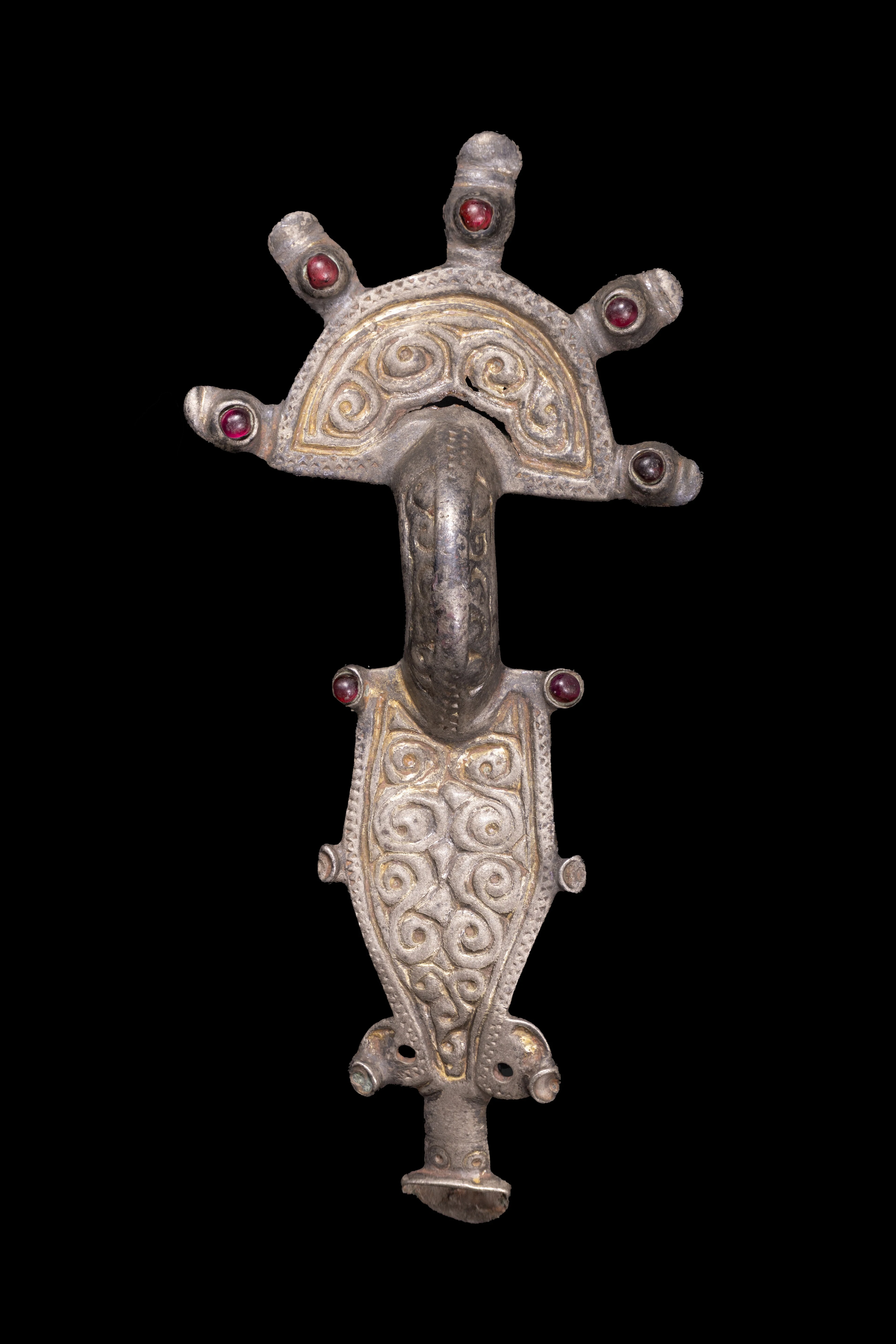OSTROGOTHIC SILVER-GILT AND GARNET RADIATE BROOCH