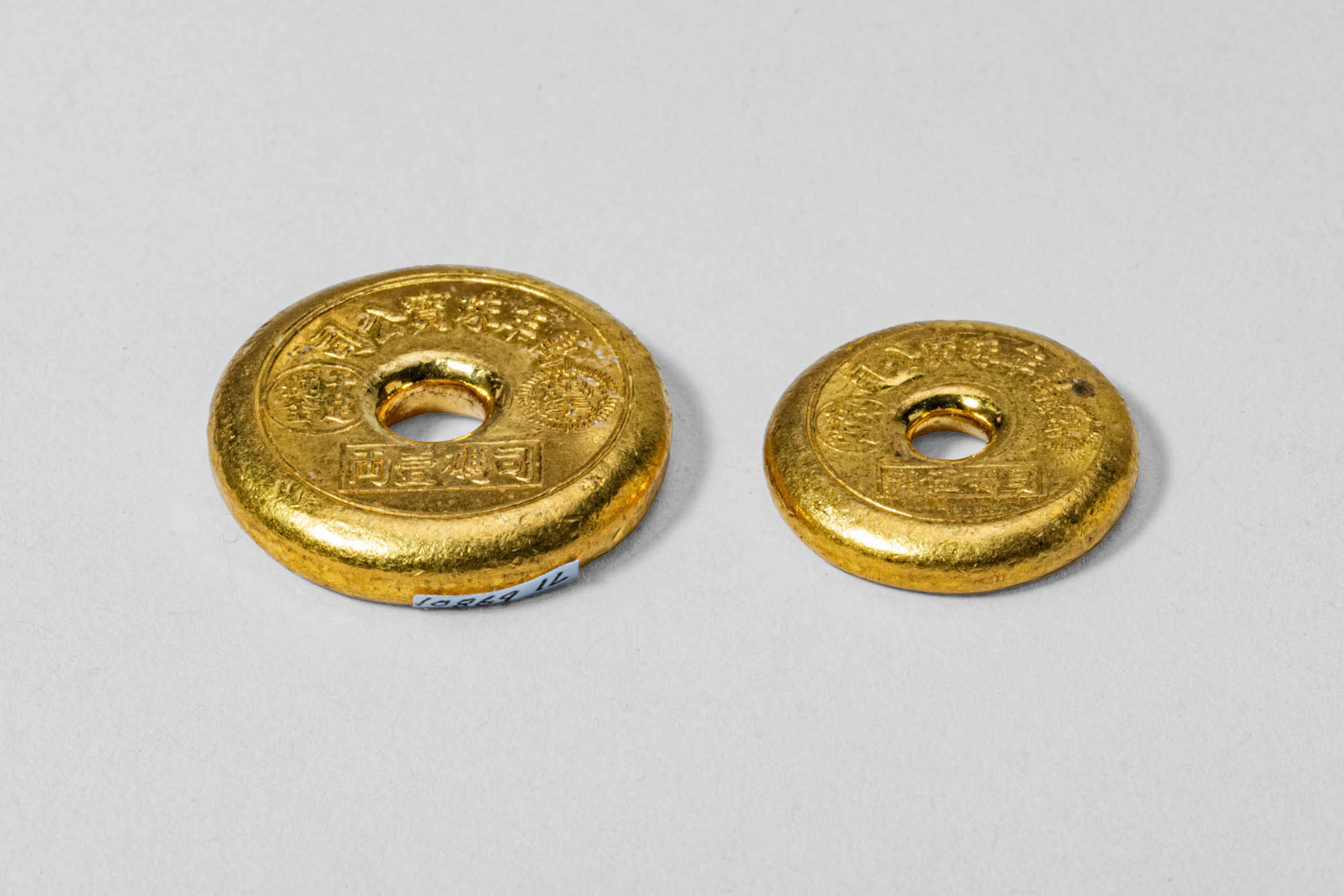 TWO CHINESE GOLD COINS, 56.2 GRAMS