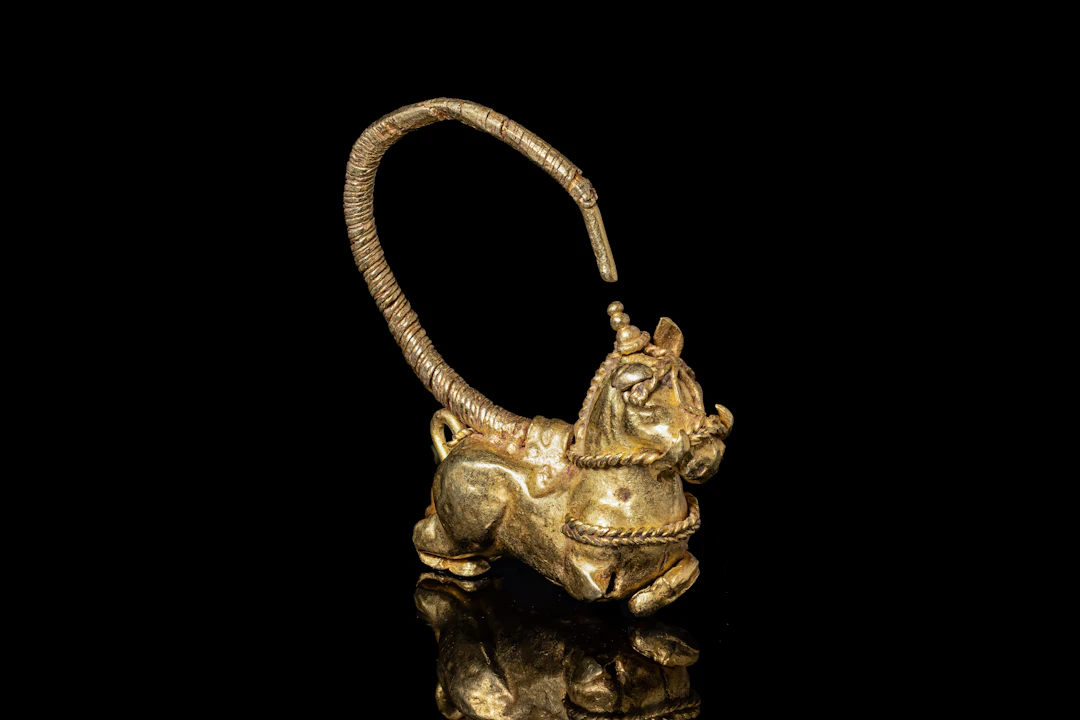 HELLENISTIC GOLD HORSE-SHAPED EARRING