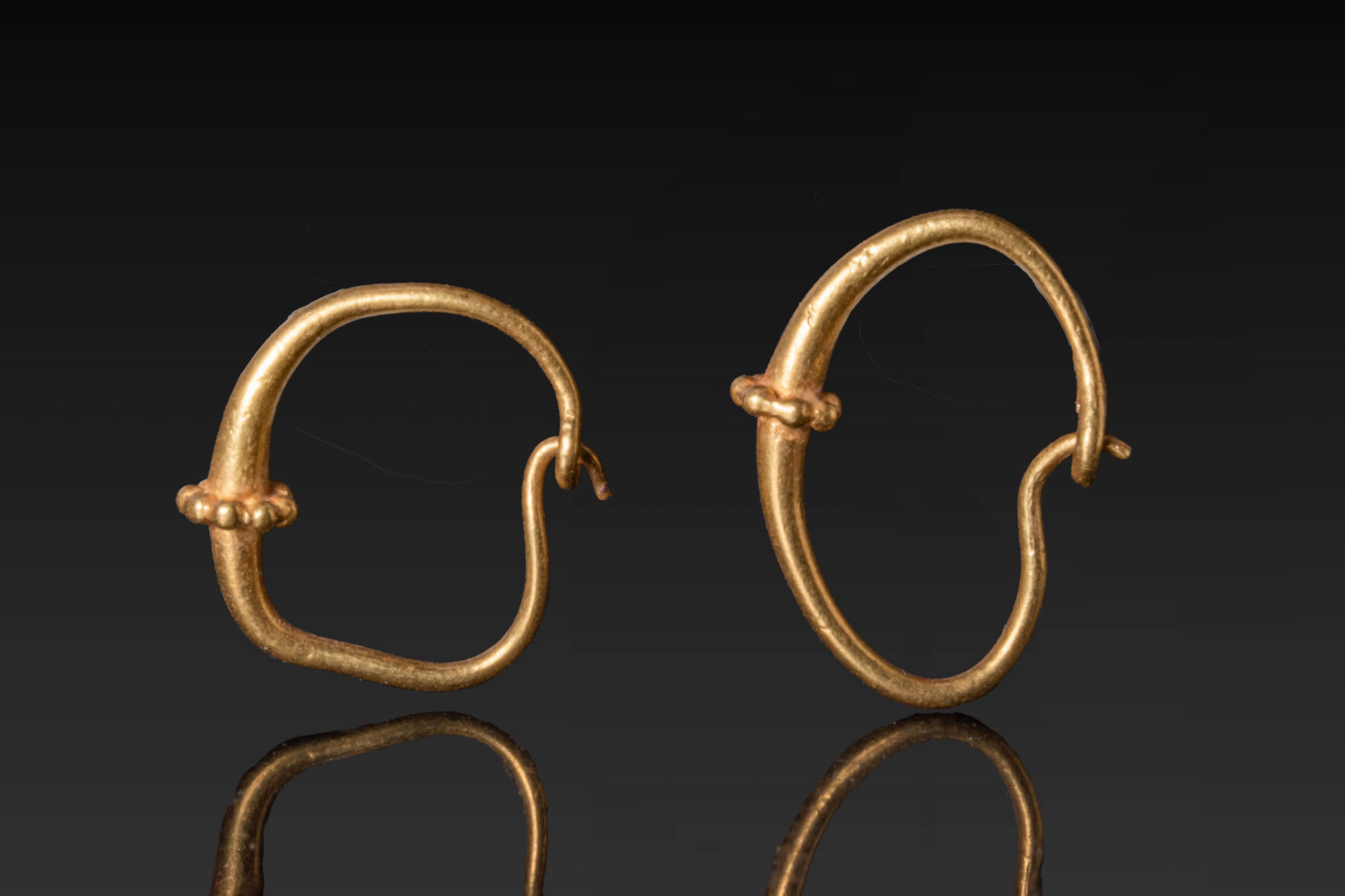 PAIR OF MATCHING GREEK GOLD EARRINGS