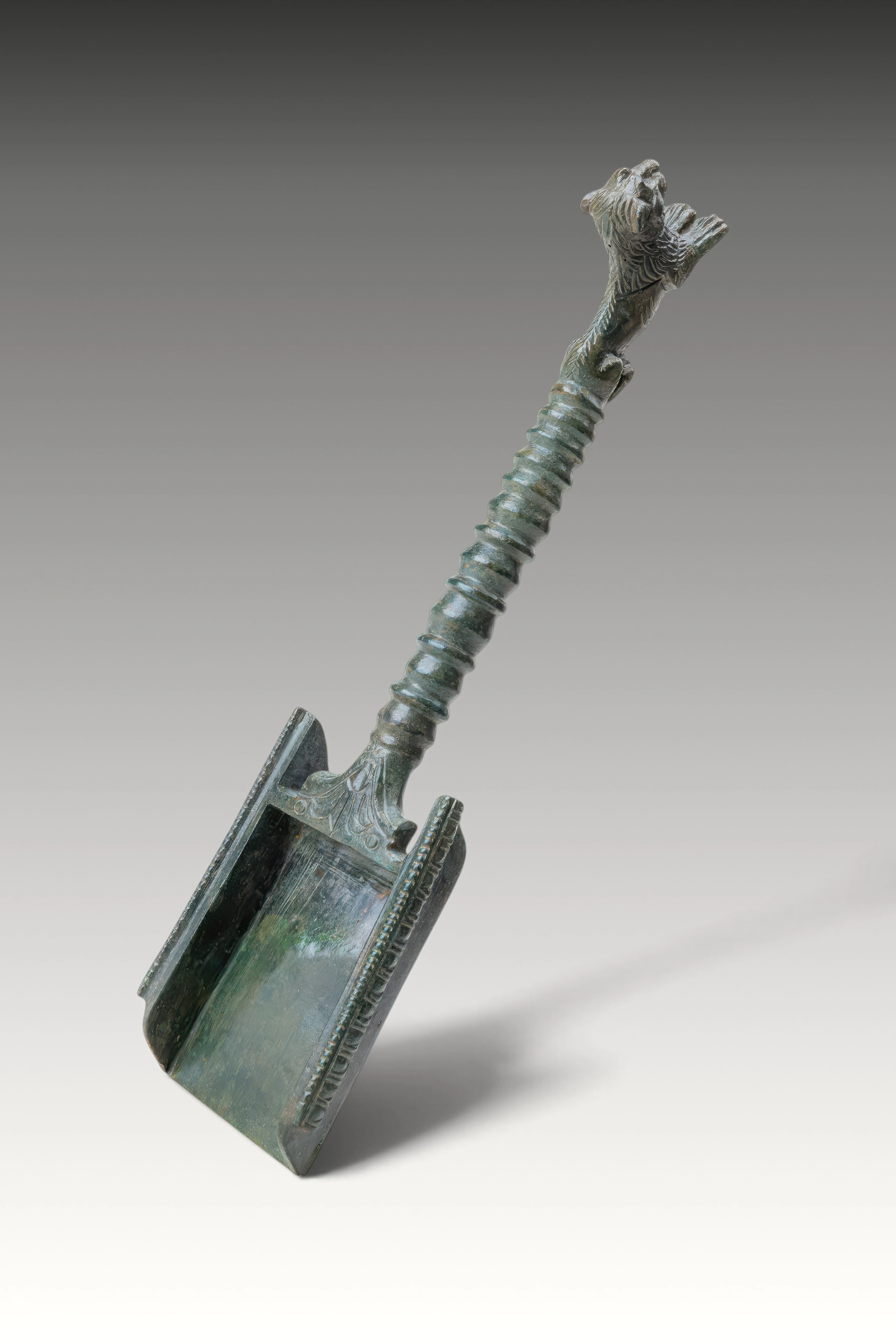 ETRUSCAN 'BATILLUM' WITH LION-SHAPED HANDLE