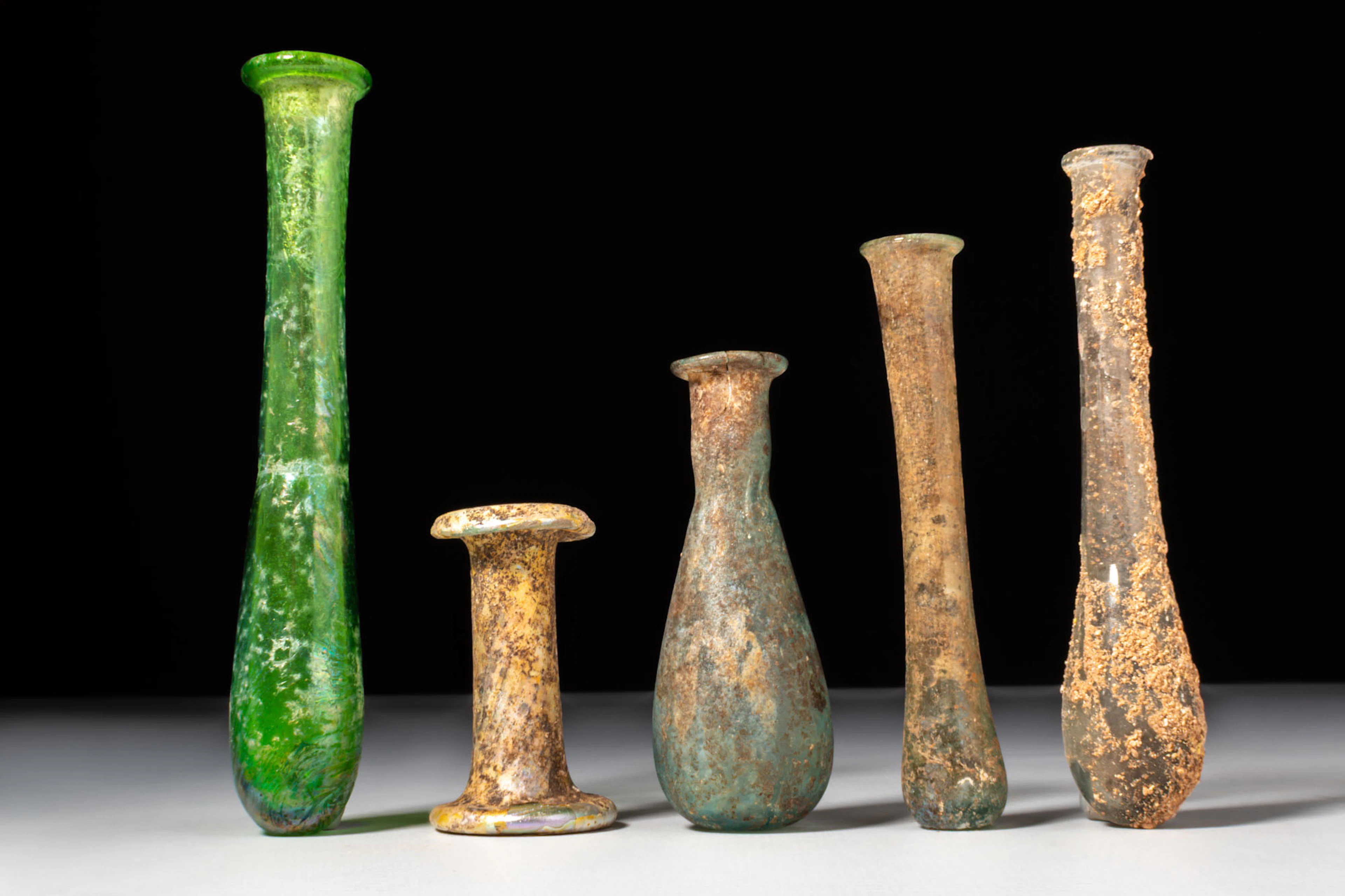 COLLECTION OF ROMAN GLASS UNGUENTARIA