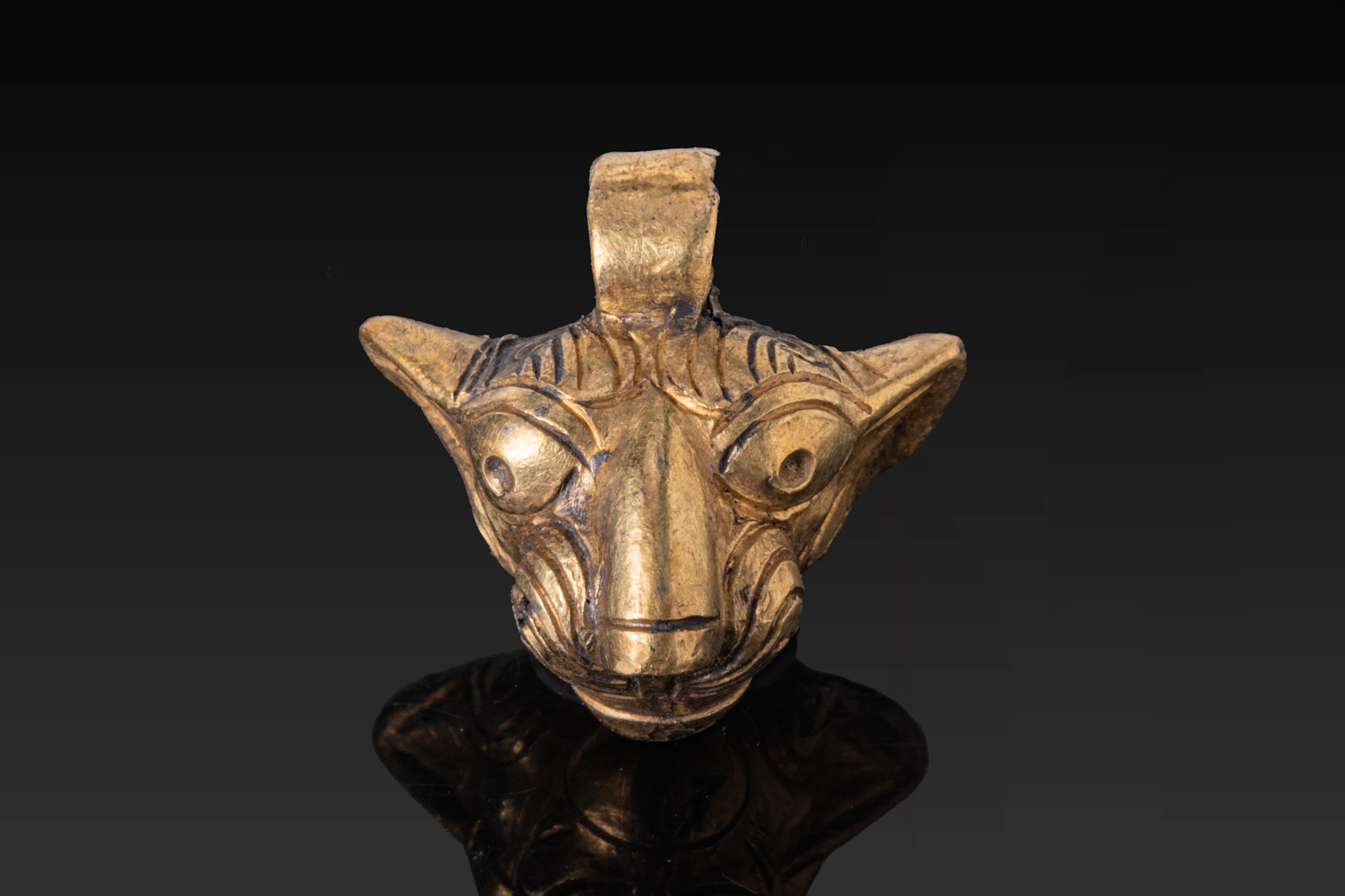 HELLENISTIC GILDED LION HEAD PENDANT