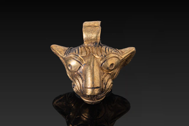 HELLENISTIC GILDED LION HEAD PENDANT