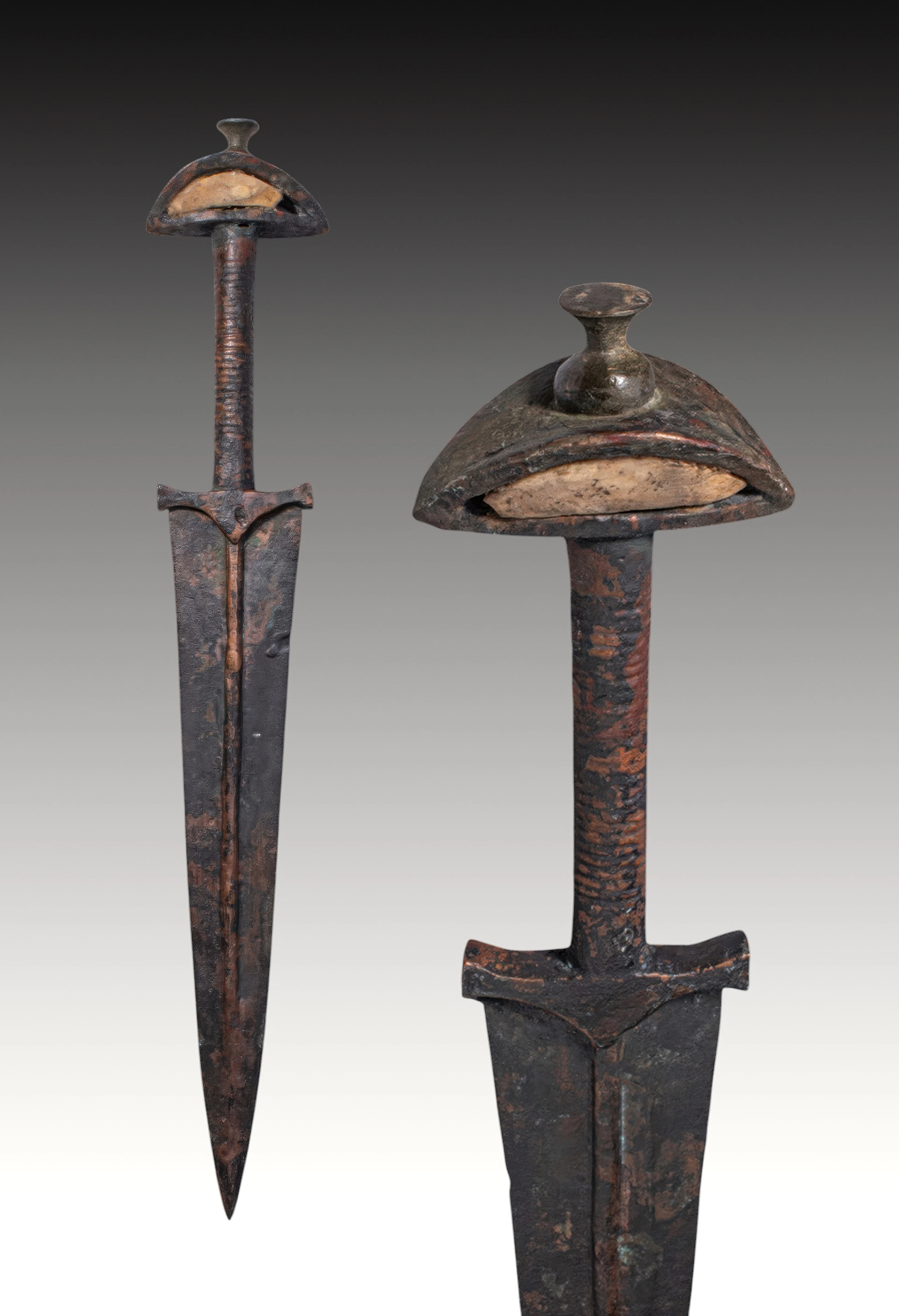 BRONZE AGE / EARLY GREEK PERIOD BRONZE DAGGER WITH STONE-INLAID POMMEL