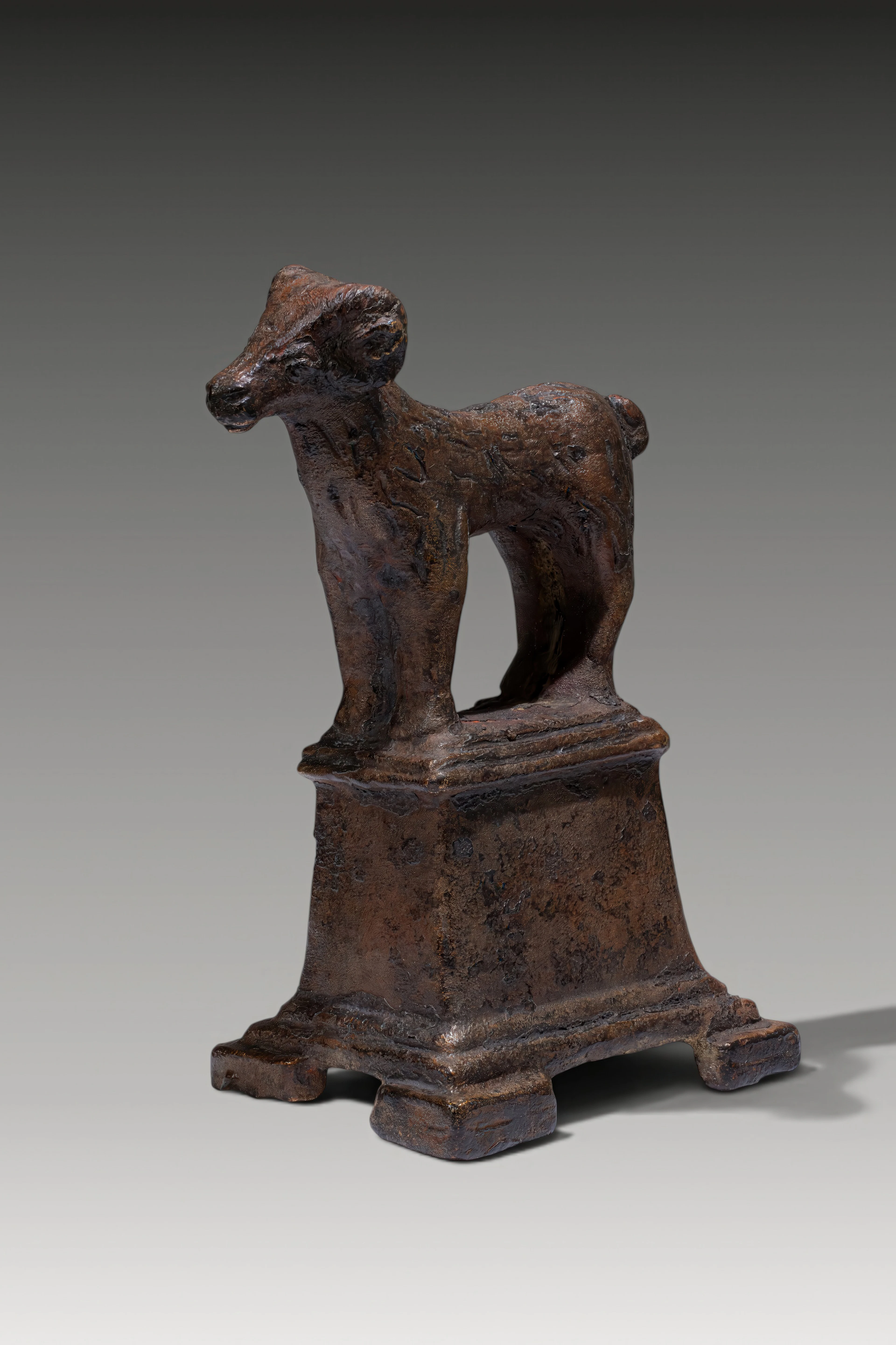 ROMAN BRONZE RAM FIGURINE ON PODIUM