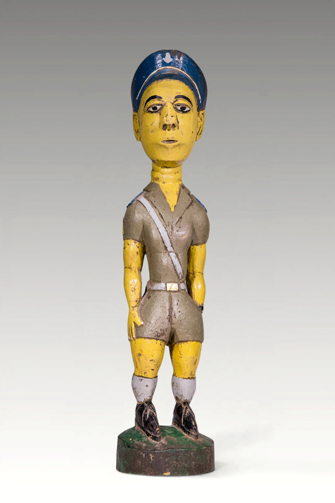 BAULE PAINTED FIGURE OF COLONIAL POLICEMAN