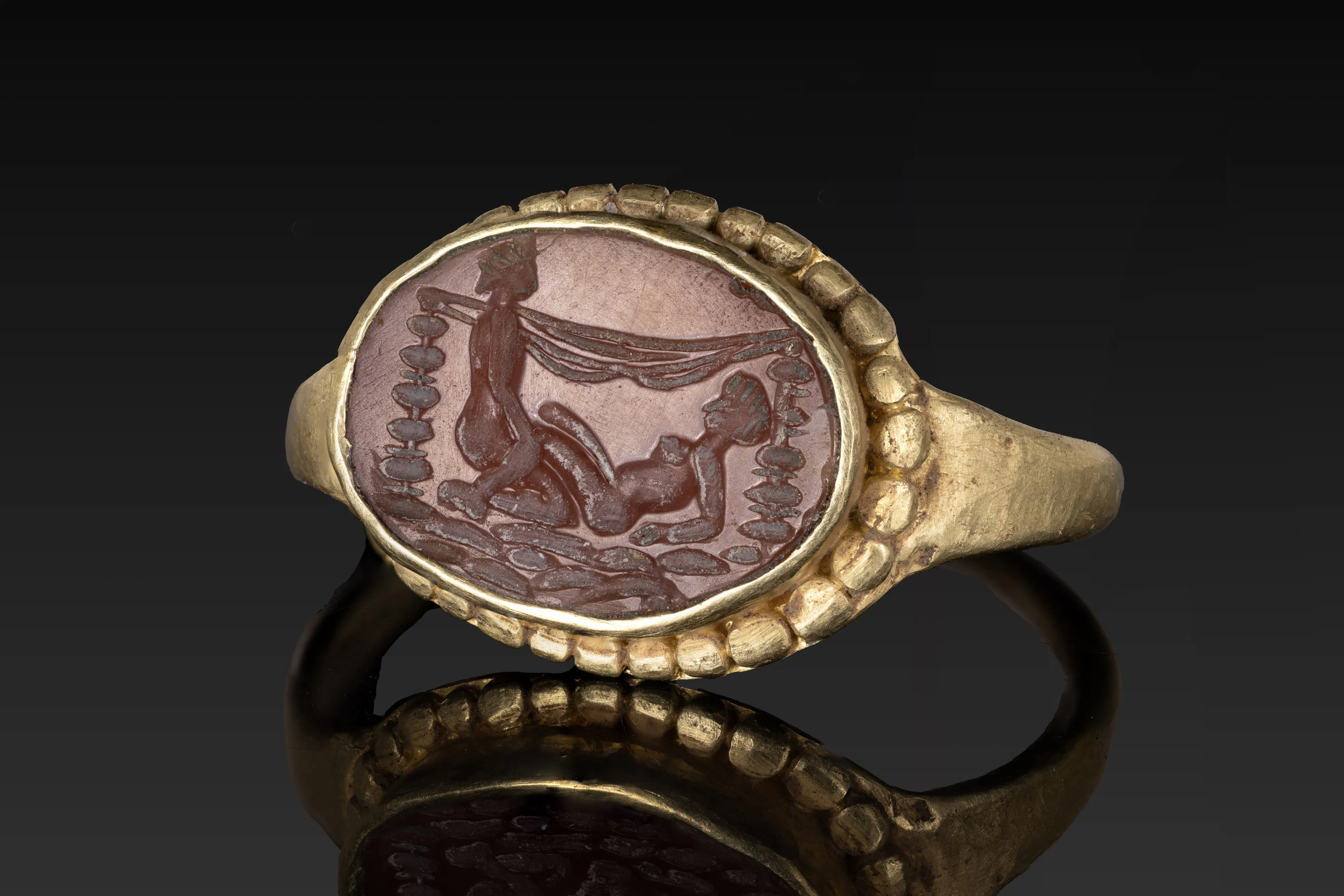 ROMAN INTAGLIO WITH EROTIC SCENE IN GOLD RING