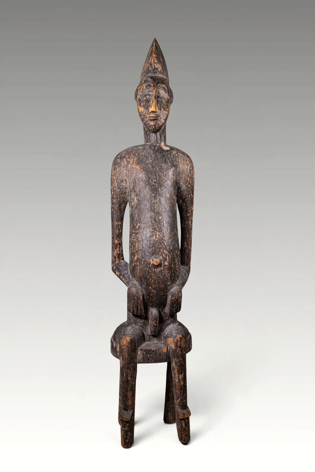 LARGE IVORY COAST SENOFO SEATED ANCESTRAL FIGURE
