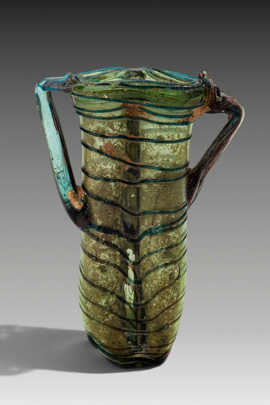 FANTASTIC ROMAN GLASS DOUBLE UNGUENTARIUM WITH GLASS THREAD DECORATION