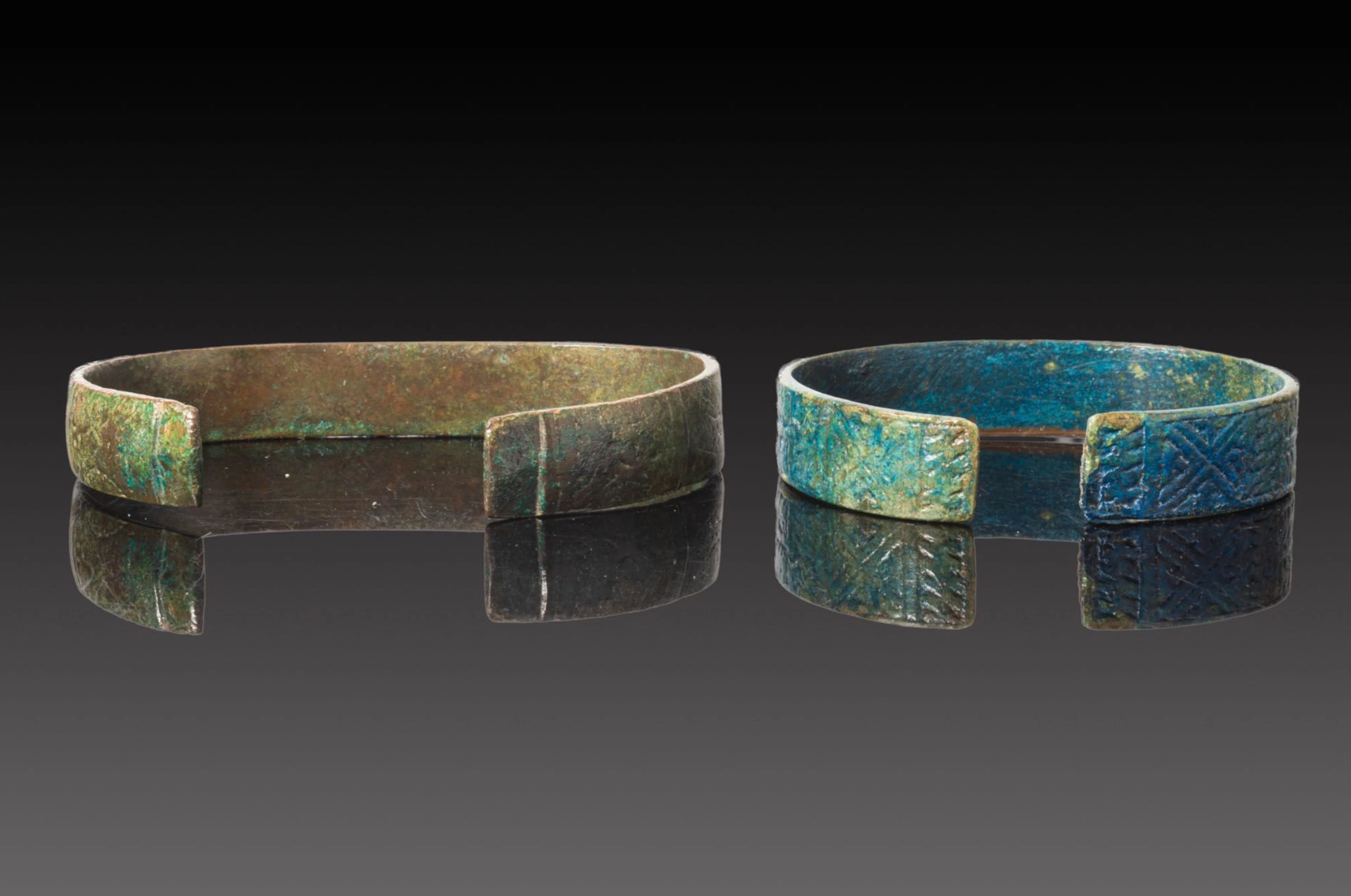 PAIR OF VIKING BRONZE DECORATED BRACELETS