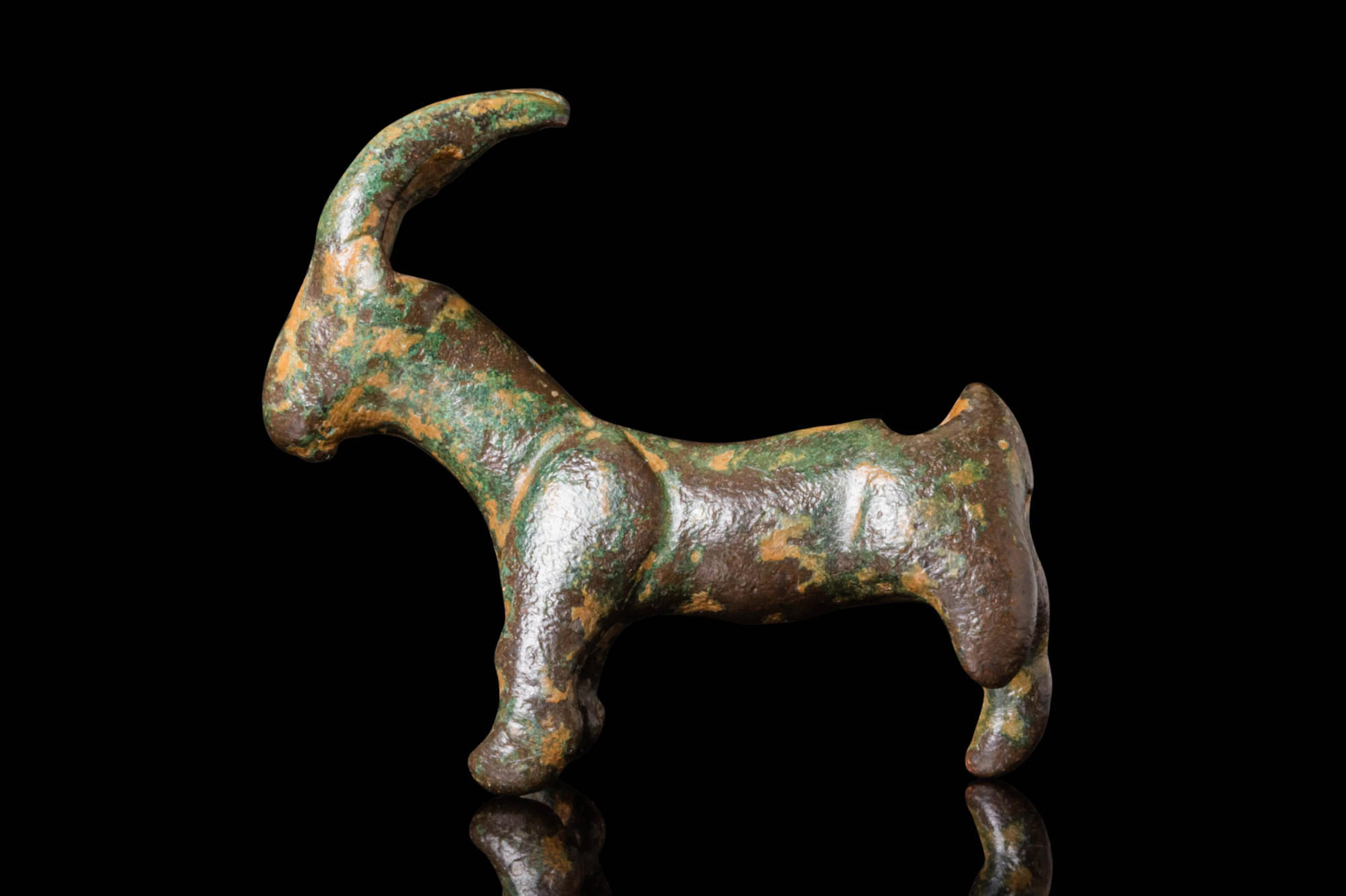 EARLY GREEK BRONZE STAG FIGURINE