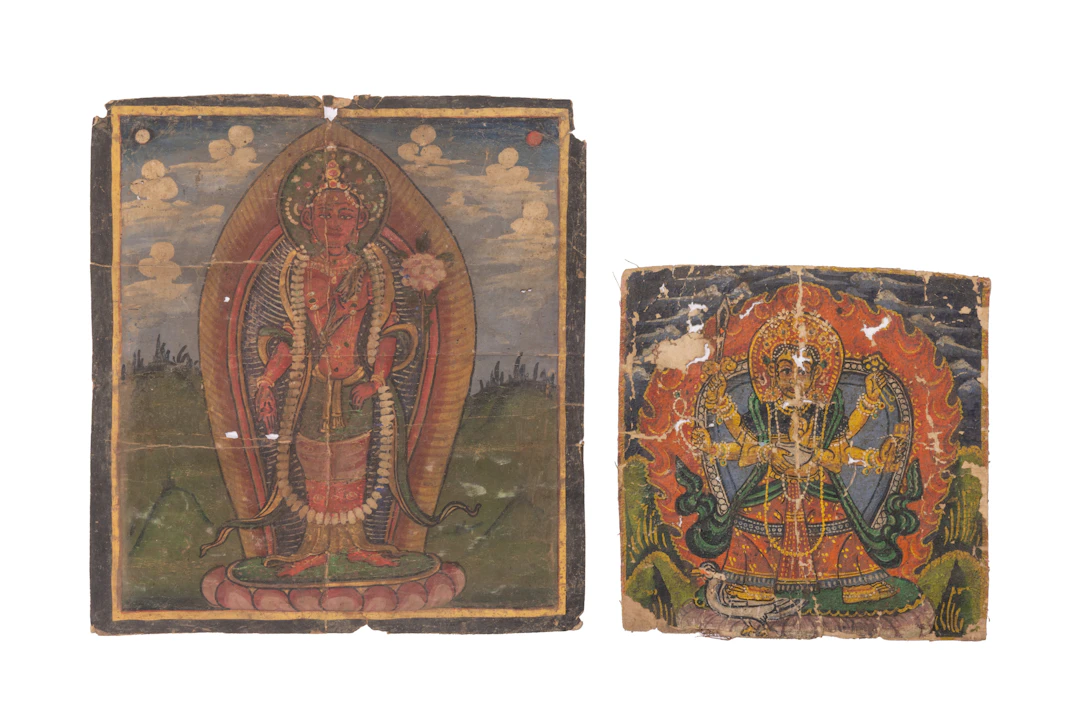 TWO TIBETAN TSAKLI PAINTINGS