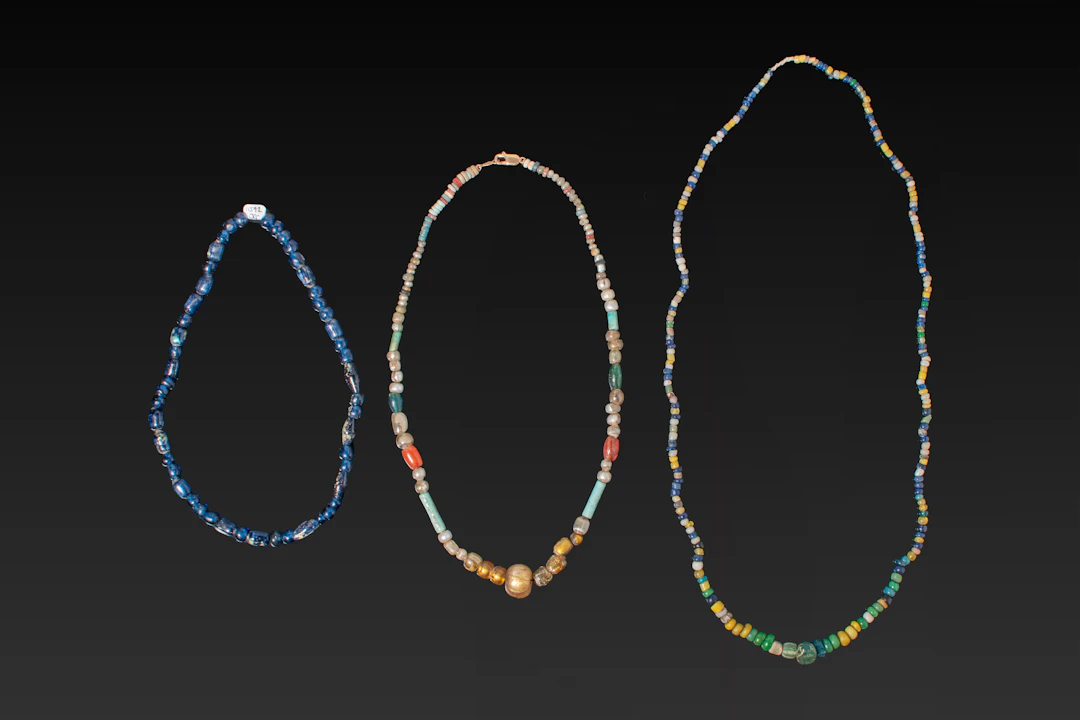 COLLECTION OF ROMANO-EGYPTIAN GLASS BEADS