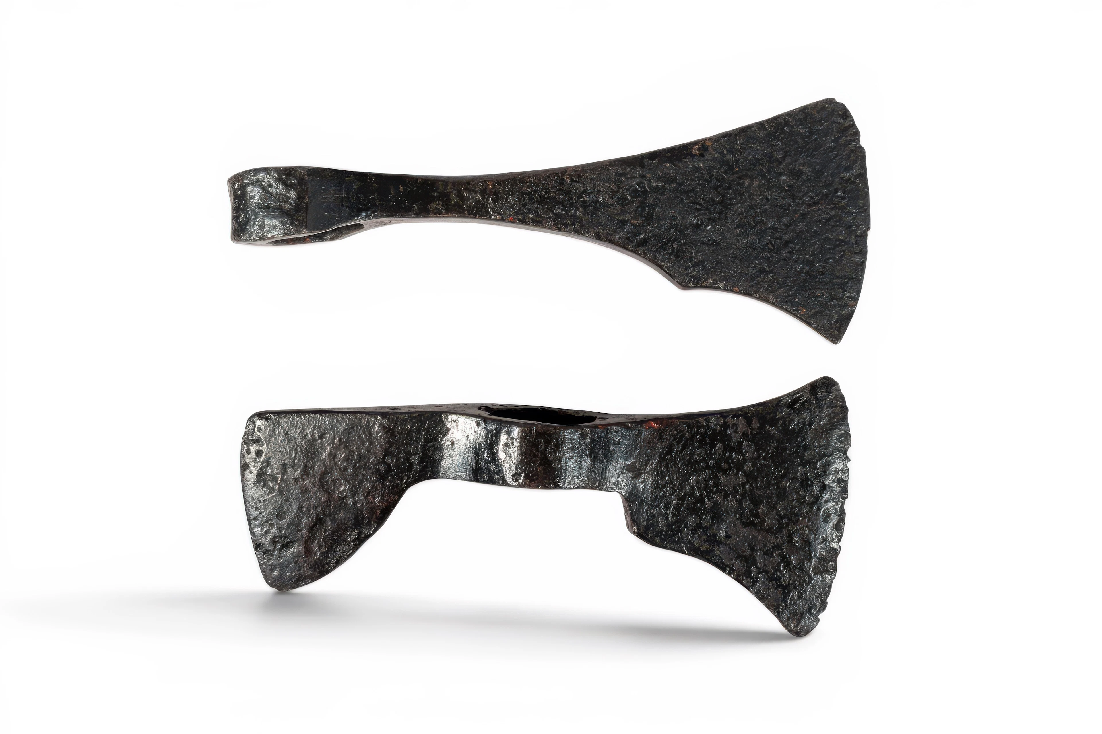 PAIR OF VIKING IRON AXE HEADS