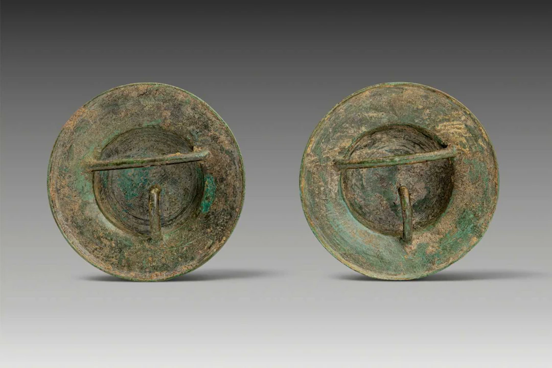 PAIR OF GREEK BRONZE UMBONES