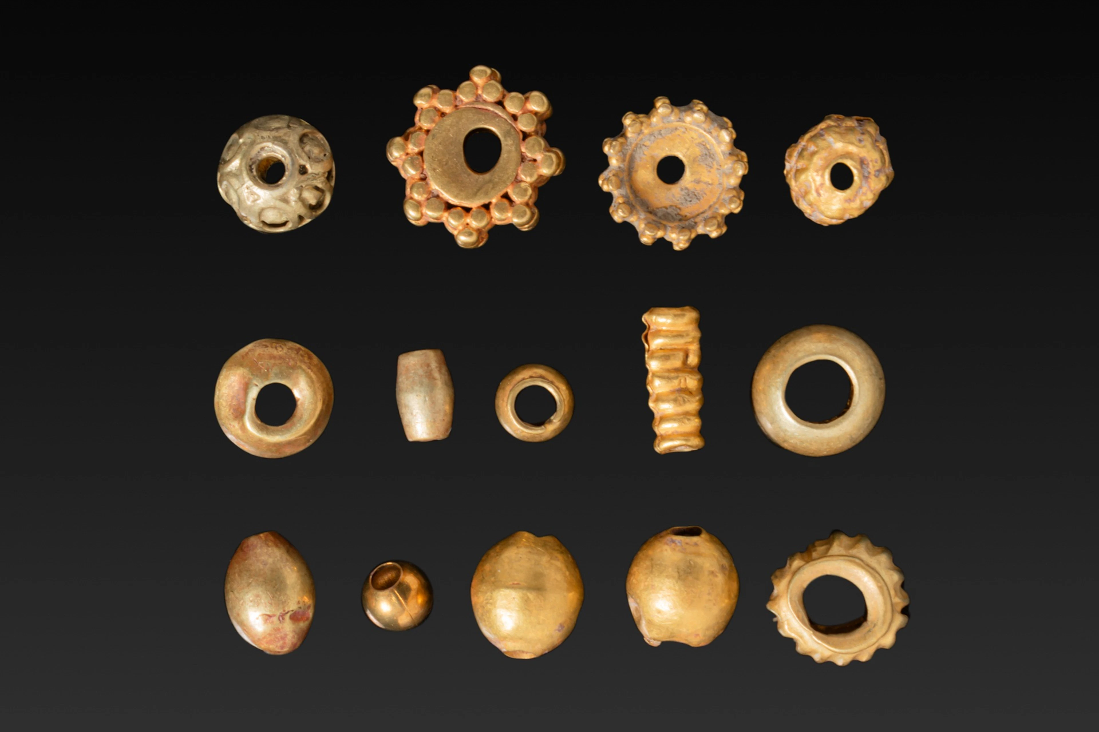 LARGE COLLECTION OF GREEK HIGH KARAT GOLD BEADS