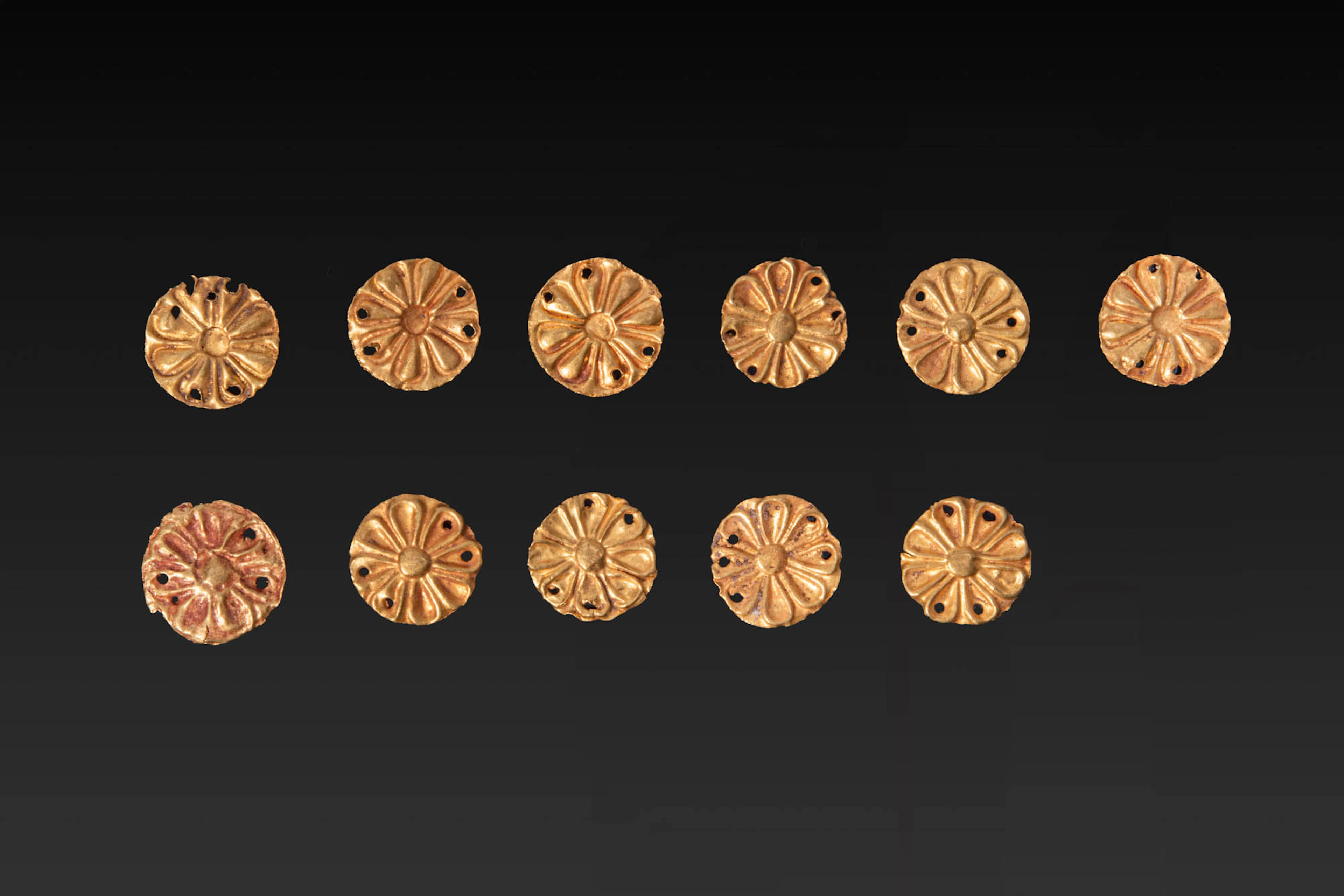 COLLECTION OF GREEK GOLD ROSETTE APPLIQUES
