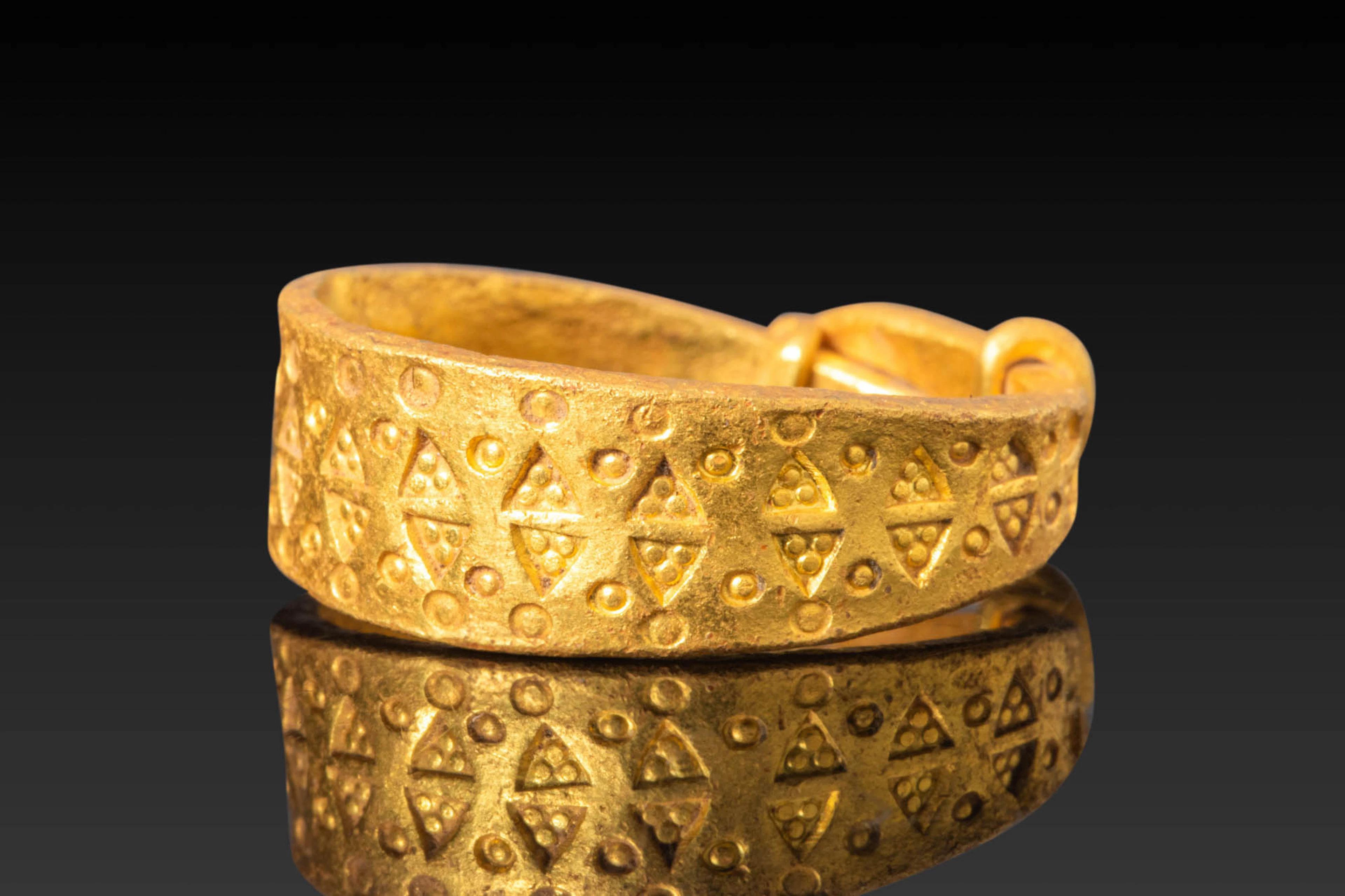 VIKING HIGH KARAT GOLD RING WITH STAMPED TRIANGLES
